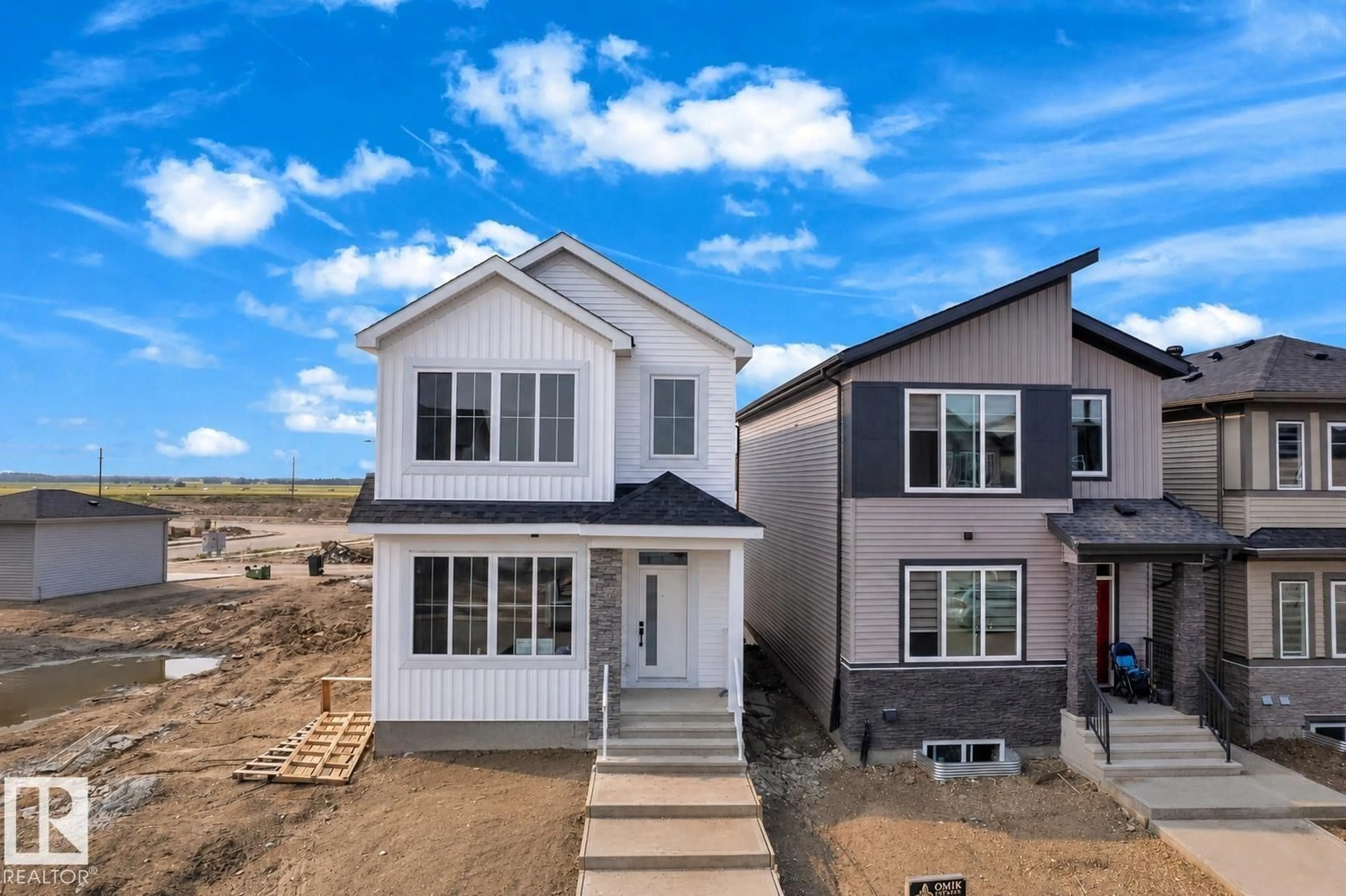 Home with vinyl exterior material, street for 458 CRYSTAL CREEK LI, Leduc Alberta T9E0X5