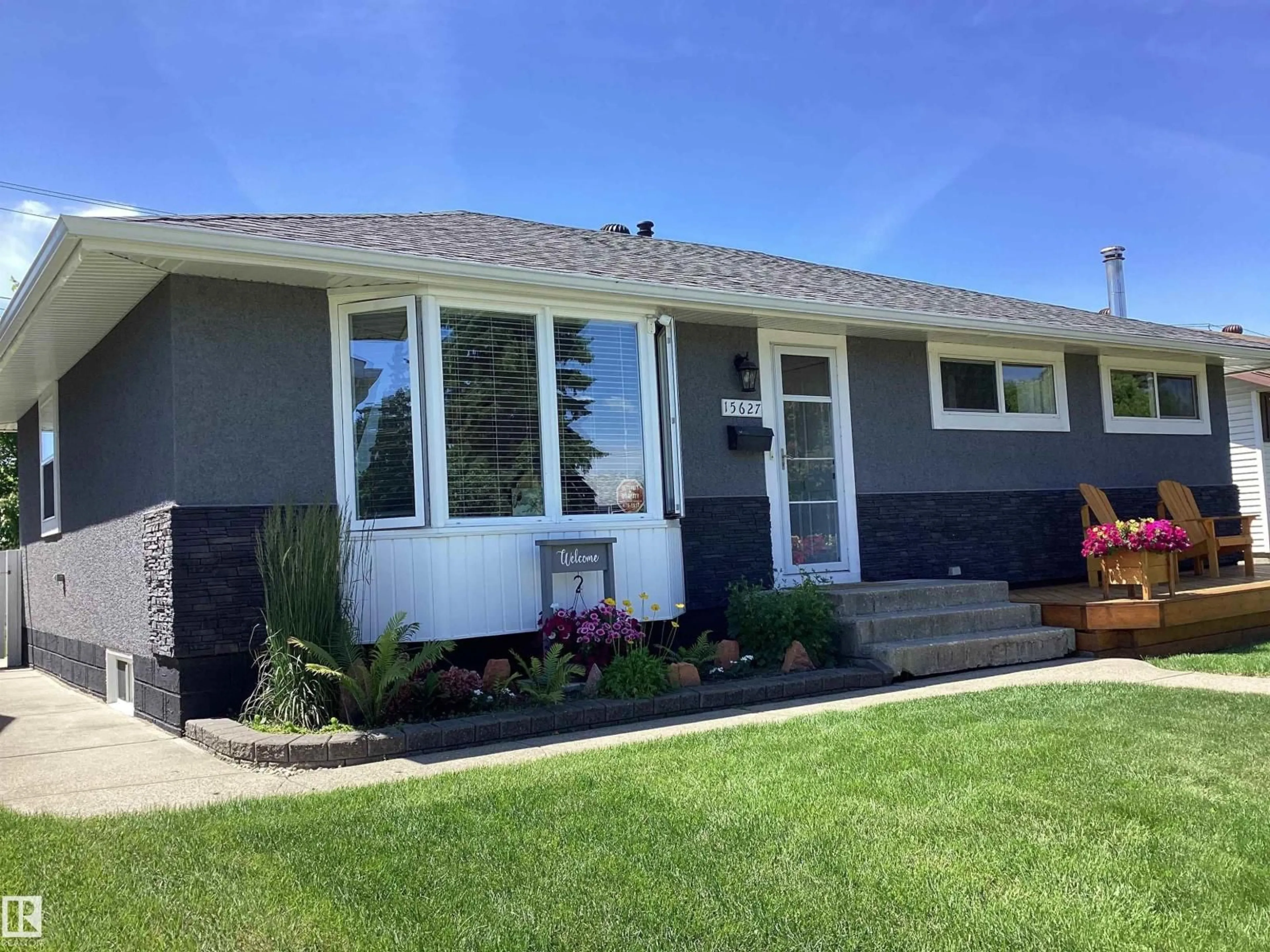 Home with vinyl exterior material, street for 15627 83 AV, Edmonton Alberta T5R3T6