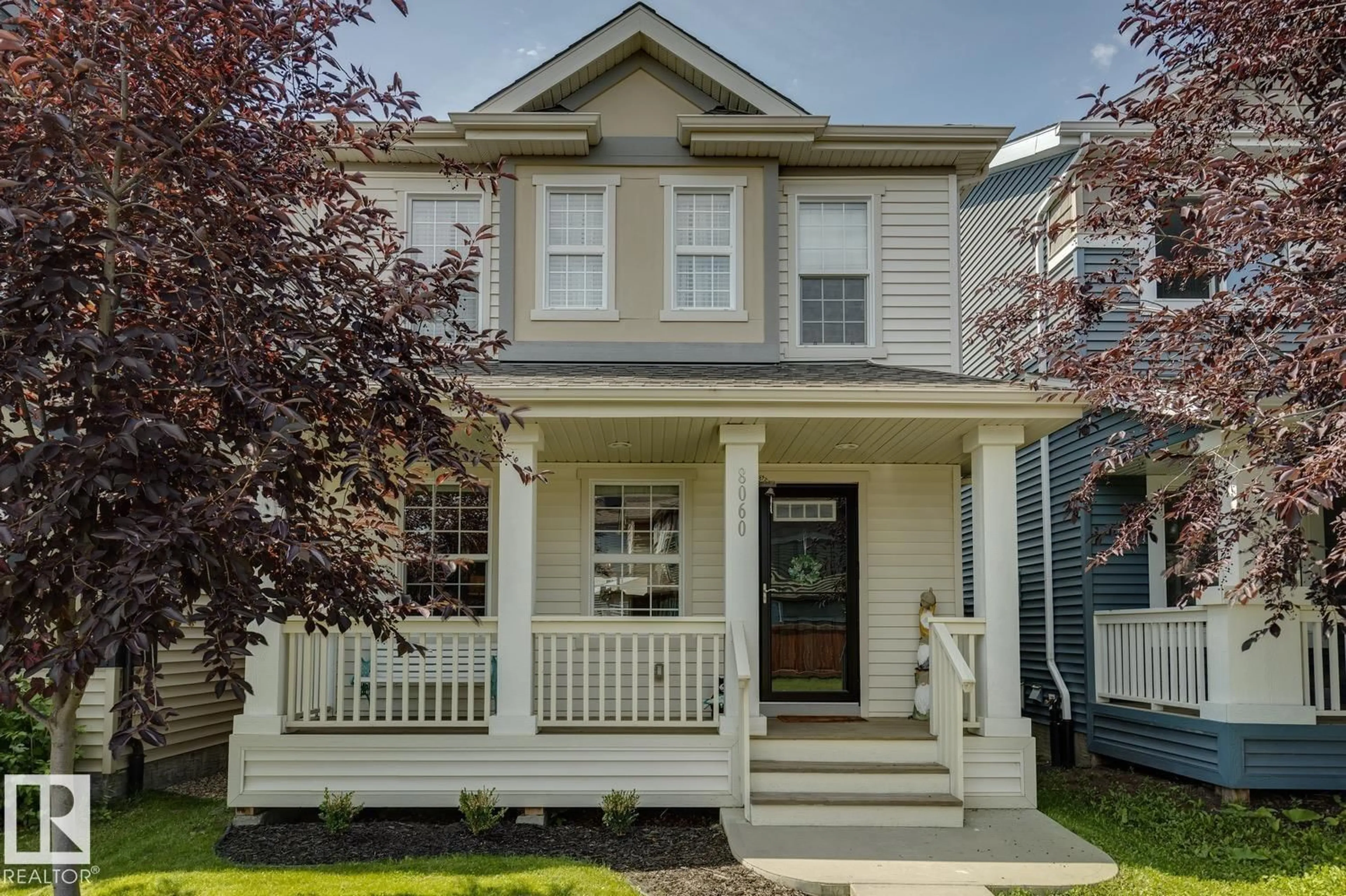 Home with vinyl exterior material, street for 8060 EVANS CR, Edmonton Alberta T6M0T8