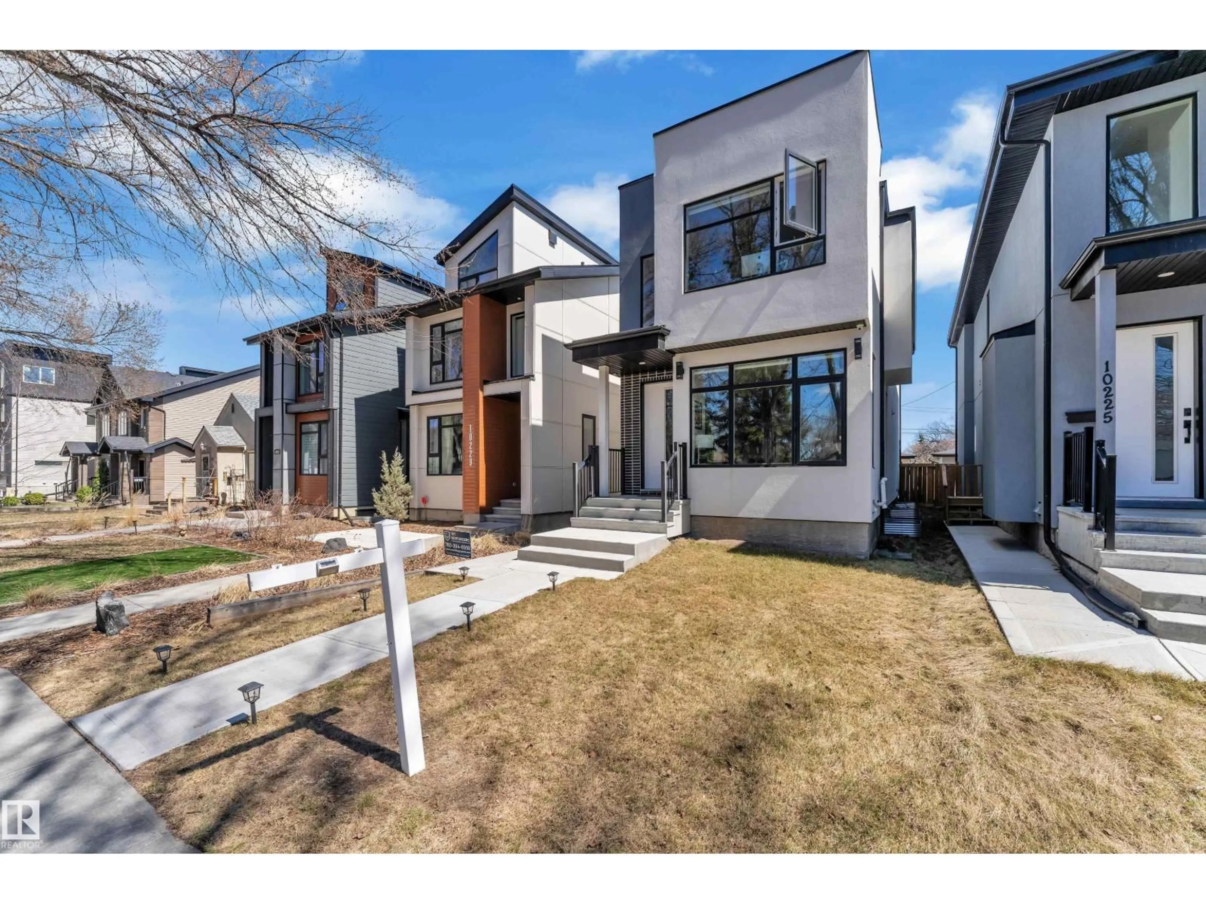 Home with brick exterior material, street for NW - 10227 146 ST, Edmonton Alberta T5N3A1