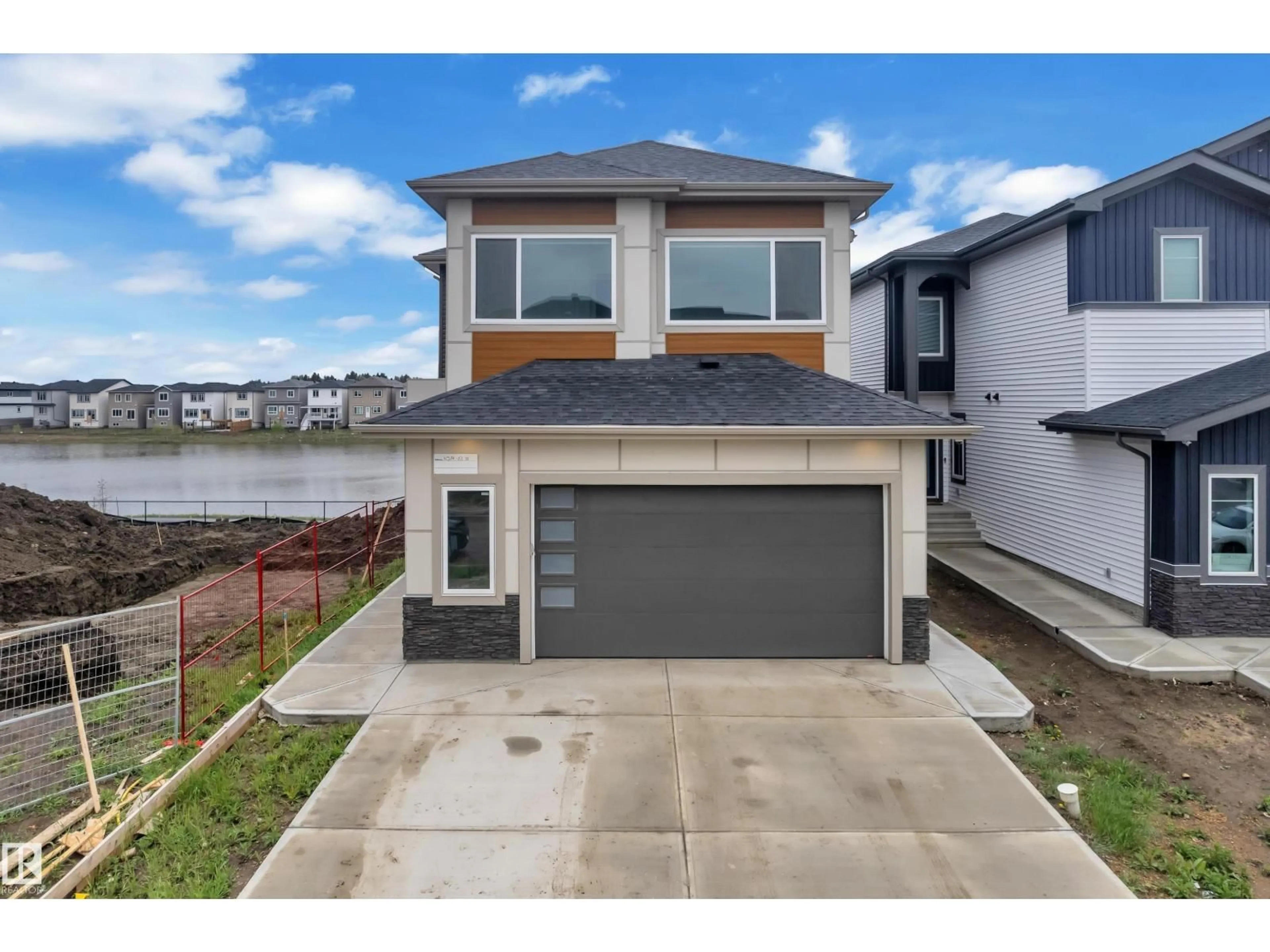 A pic from outside/outdoor area/front of a property/back of a property/a pic from drone, water/lake/river/ocean view for 4514 63 ST, Beaumont Alberta T4X2Z2