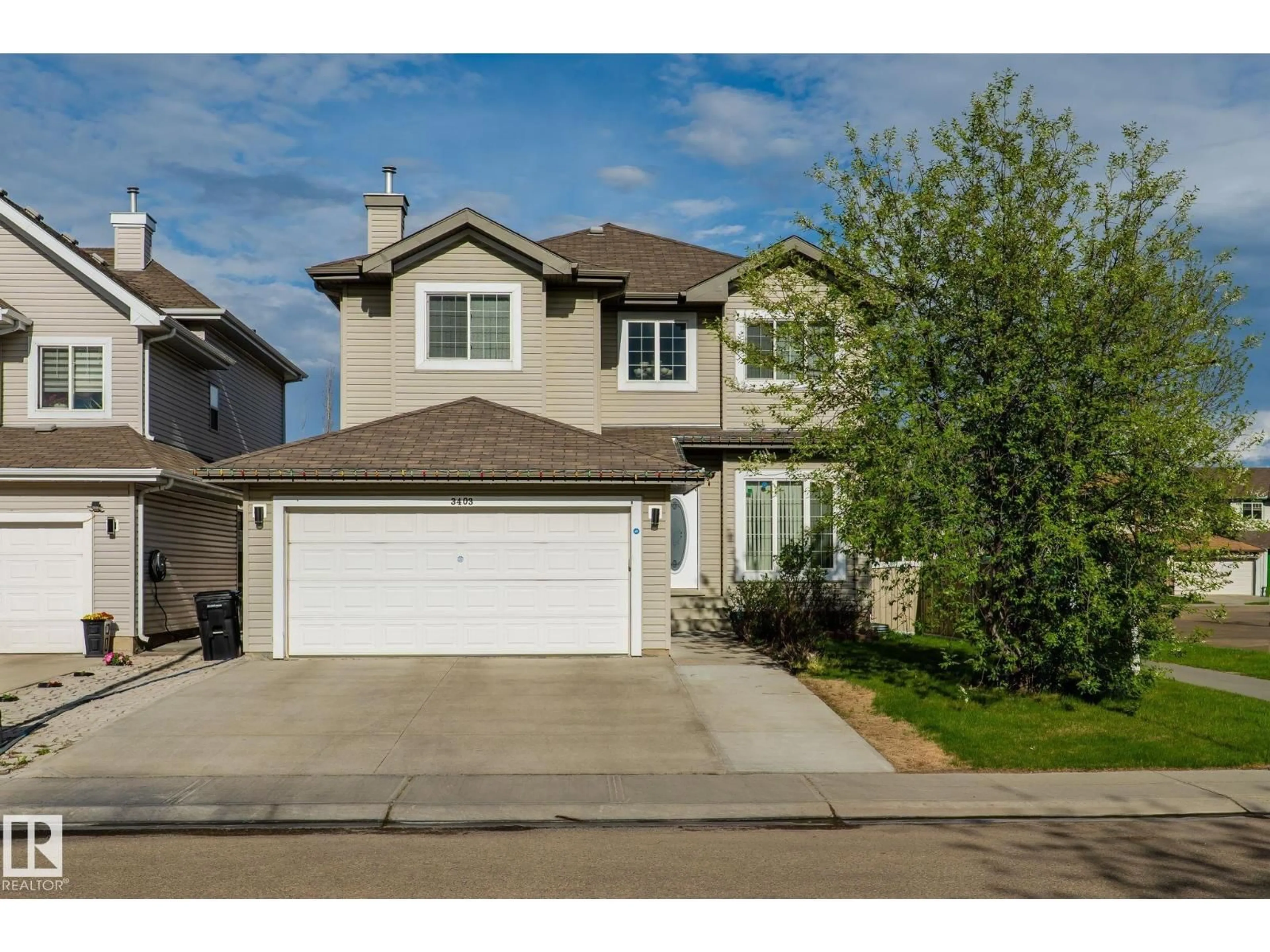 Home with vinyl exterior material, street for 3403 23 NW, Edmonton Alberta T6T0B2
