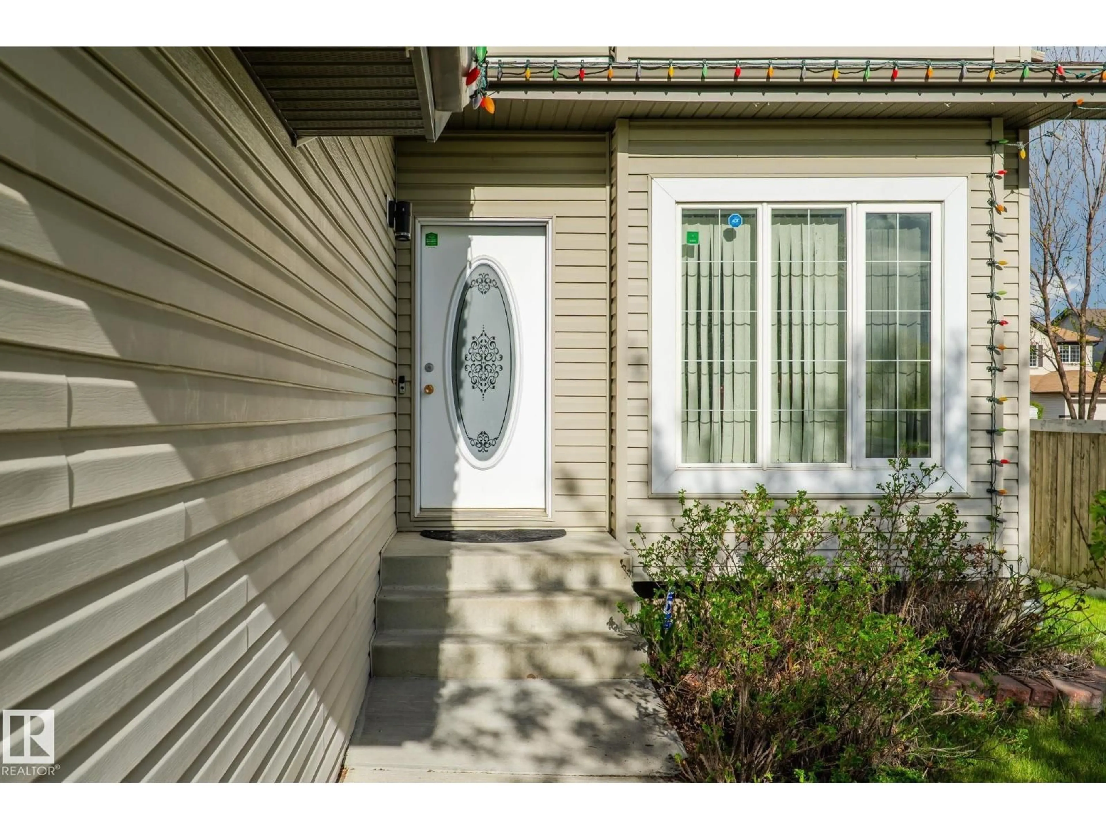 Home with vinyl exterior material, street for 3403 23 NW, Edmonton Alberta T6T0B2