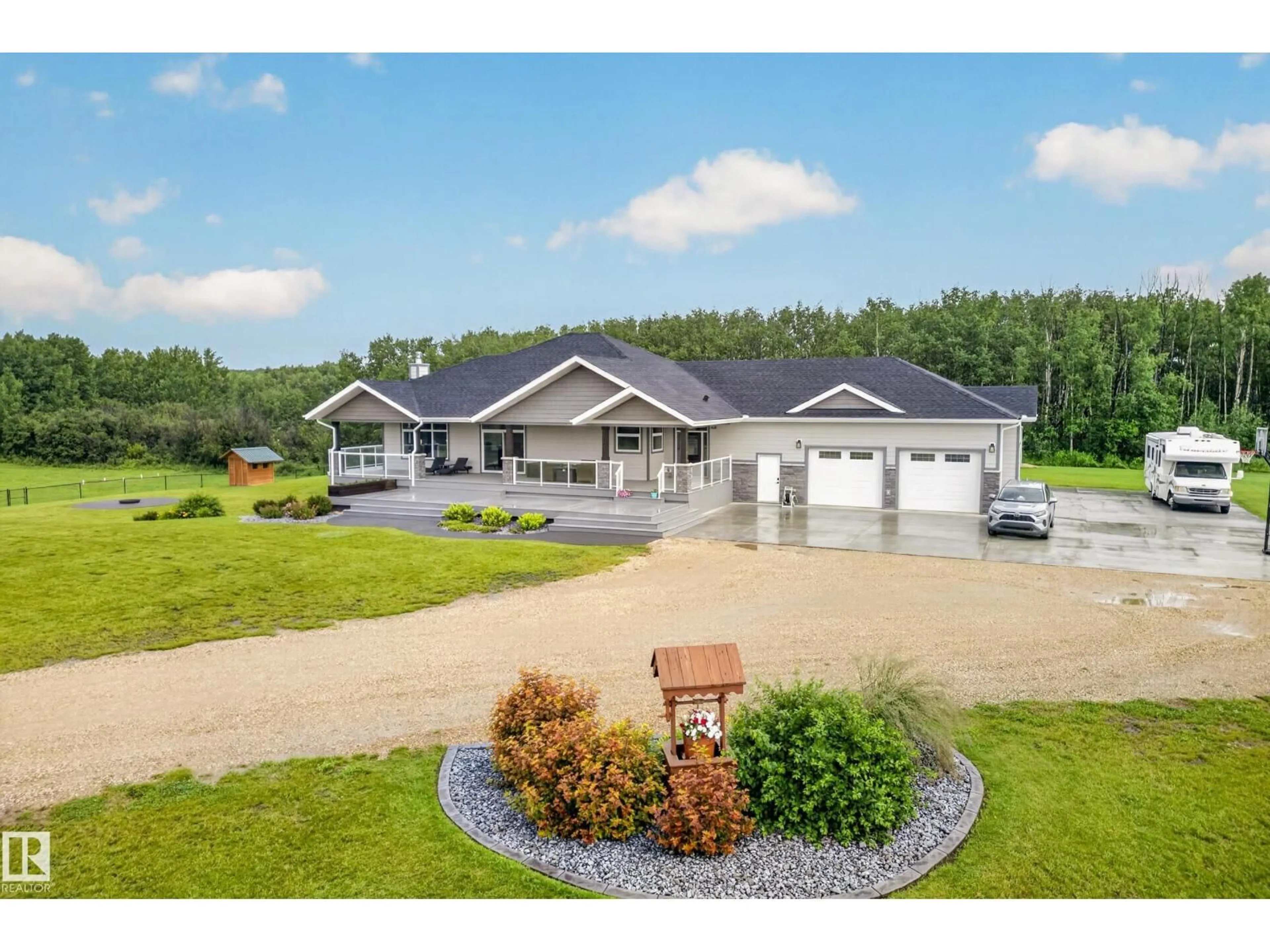A pic from outside/outdoor area/front of a property/back of a property/a pic from drone, water/lake/river/ocean view for 52502 RGE ROAD 22 A, Rural Parkland County Alberta T7Y3C5
