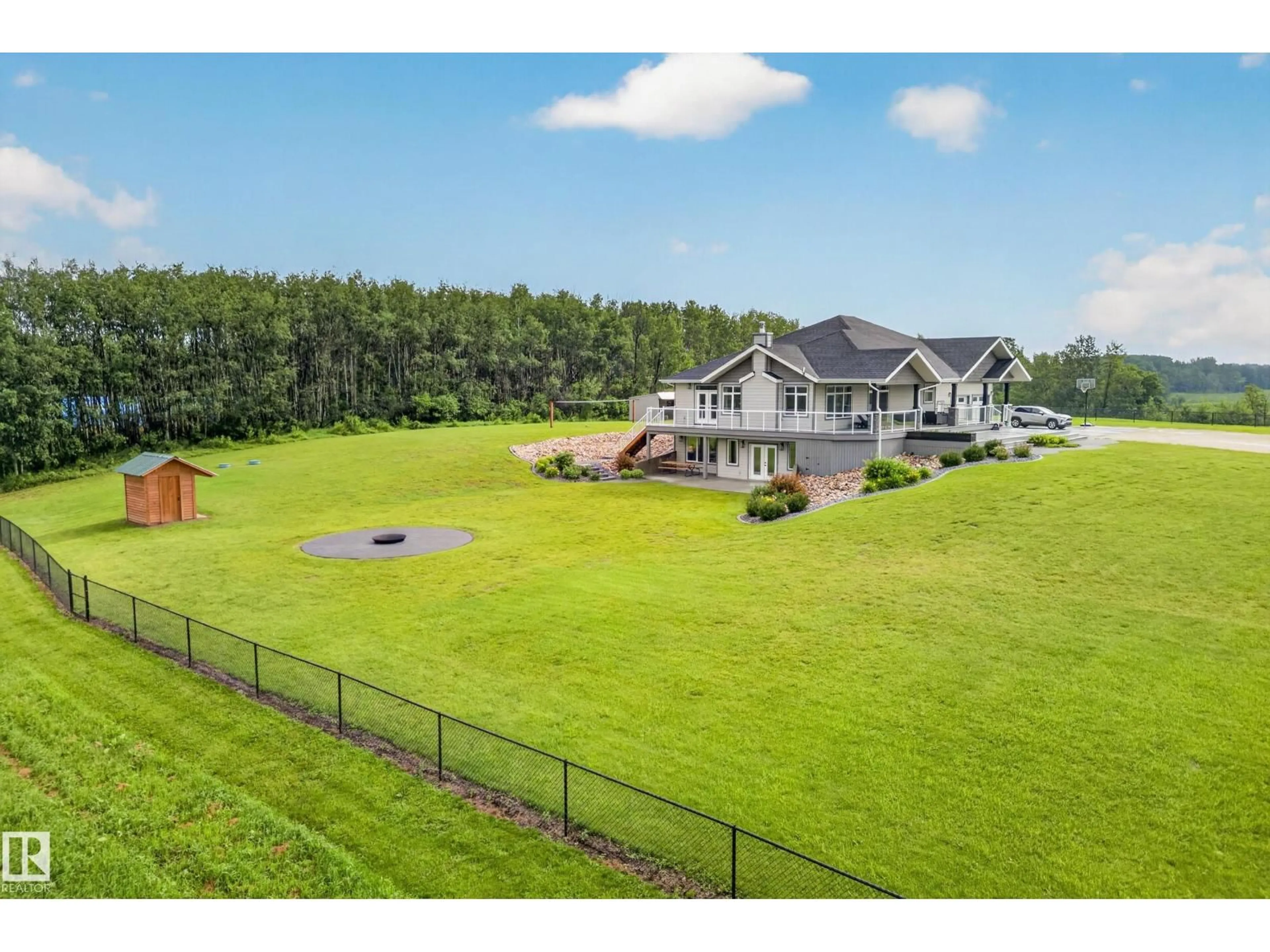 A pic from outside/outdoor area/front of a property/back of a property/a pic from drone, water/lake/river/ocean view for 52502 RGE ROAD 22 A, Rural Parkland County Alberta T7Y3C5