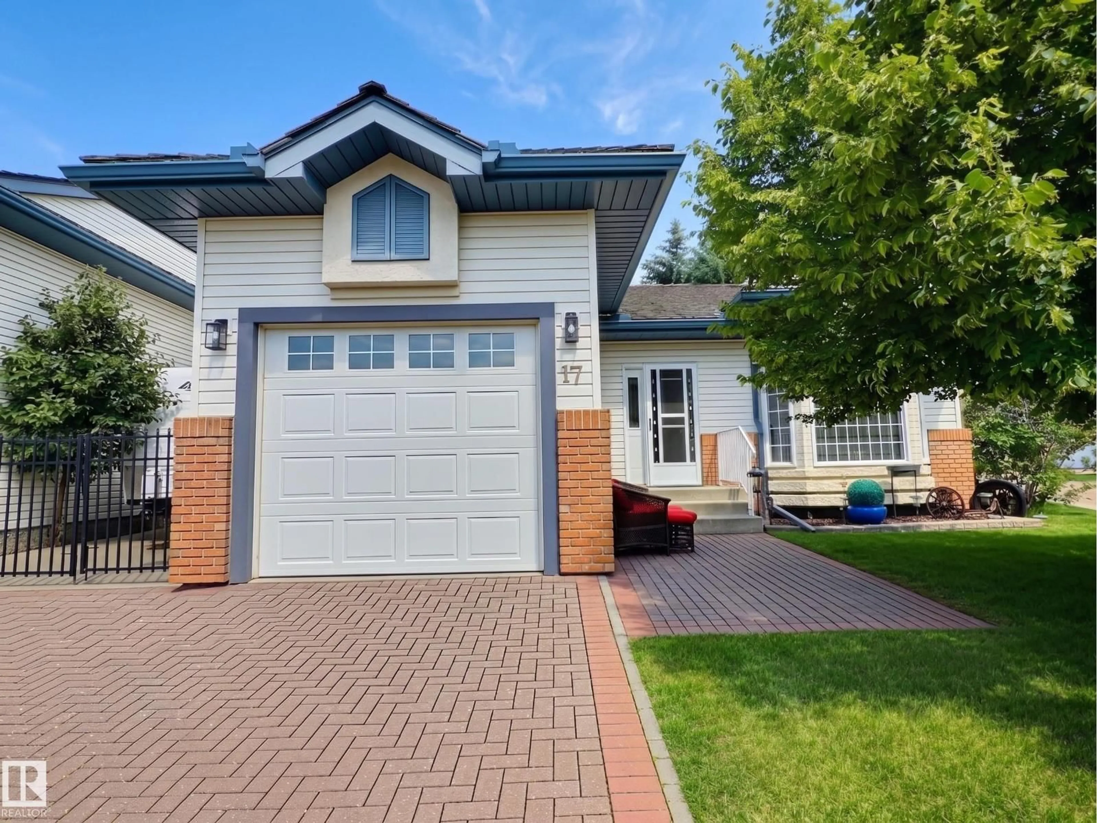 Home with vinyl exterior material, street for 10 - 17 BLACKBURN DR, Edmonton Alberta T6W1C2