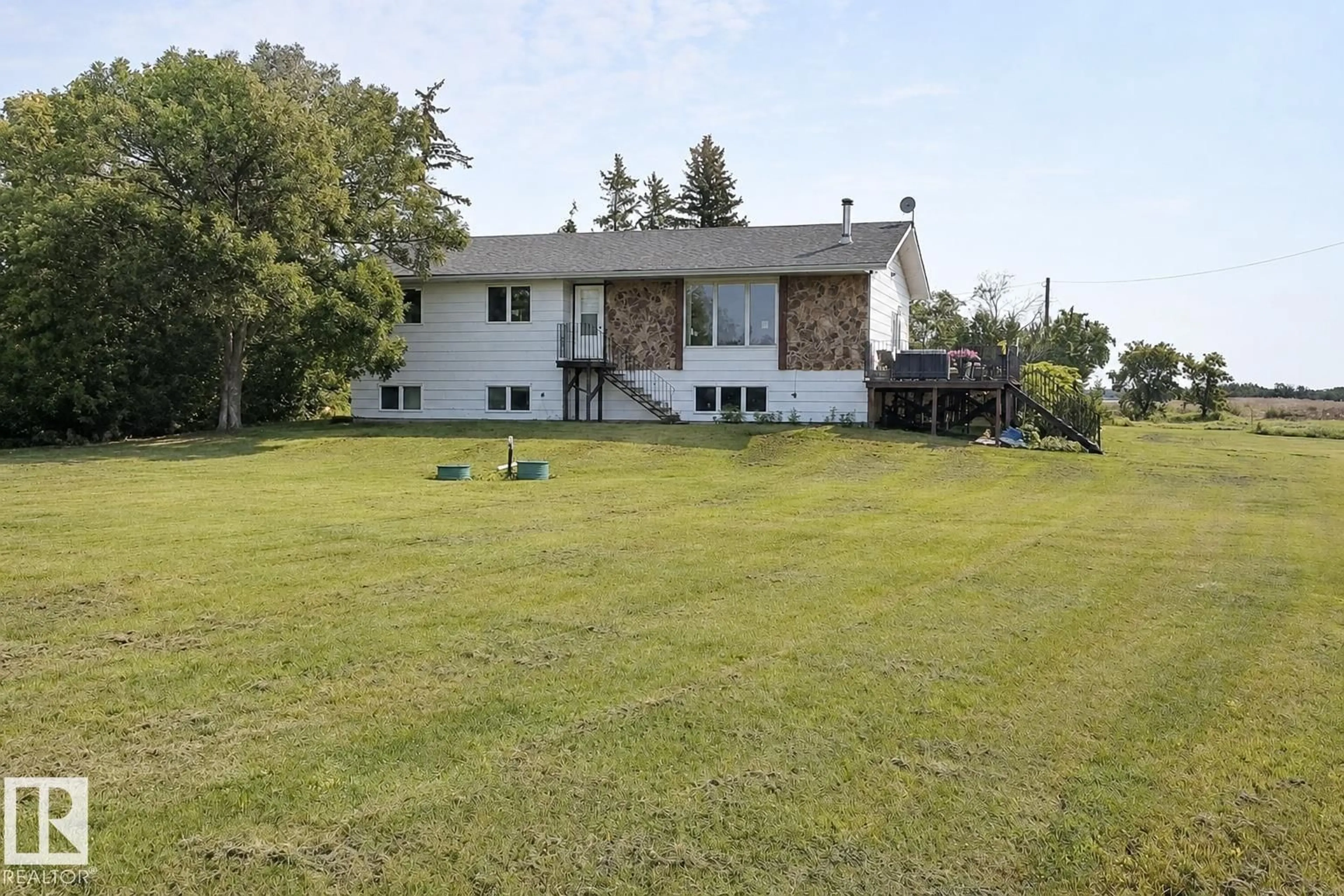 A pic from outside/outdoor area/front of a property/back of a property/a pic from drone, unknown for 532077 RR 180, Rural Lamont County Alberta T0B3H0