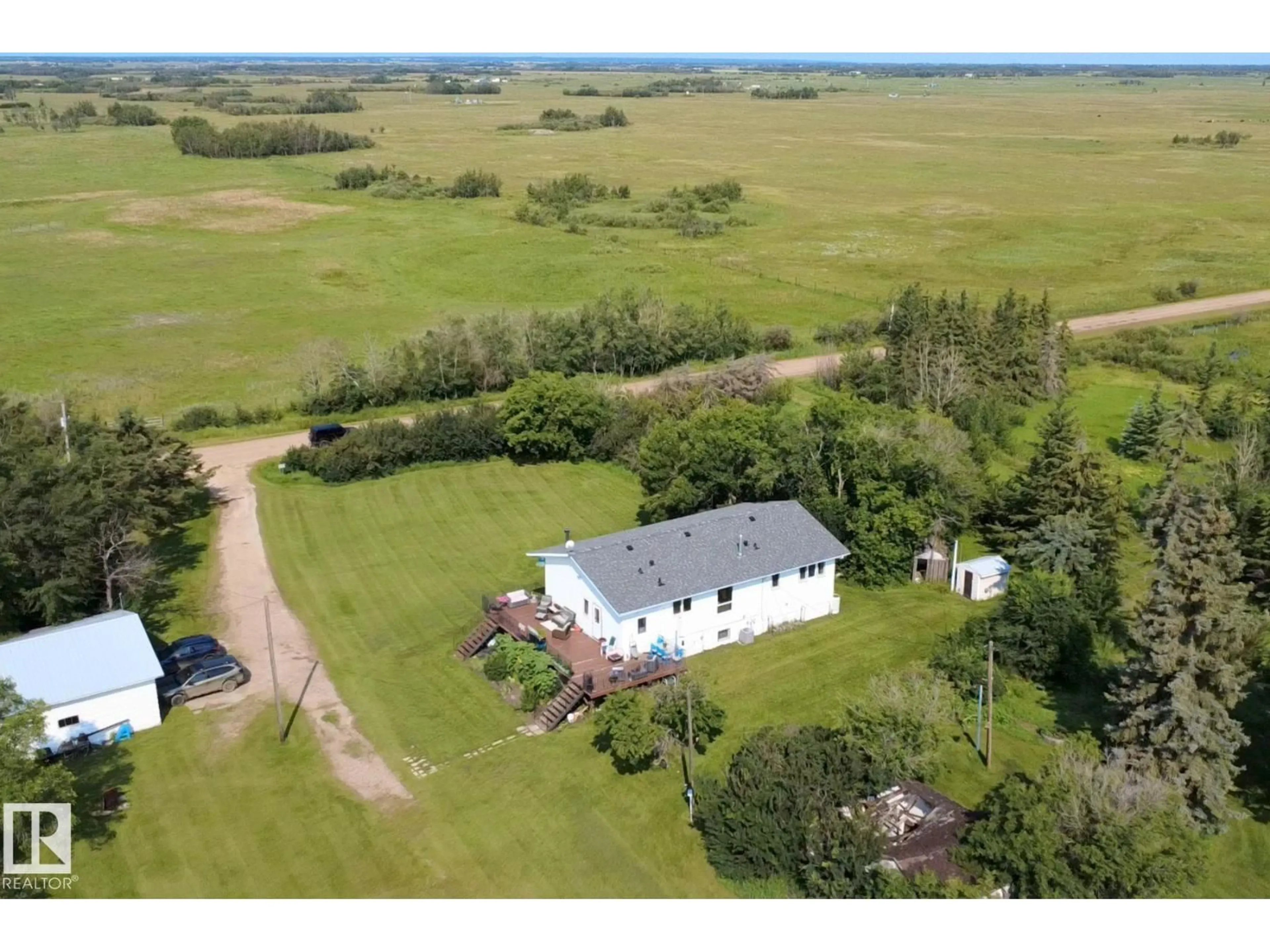 A pic from outside/outdoor area/front of a property/back of a property/a pic from drone, unknown for 532077 RR 180, Rural Lamont County Alberta T0B3H0