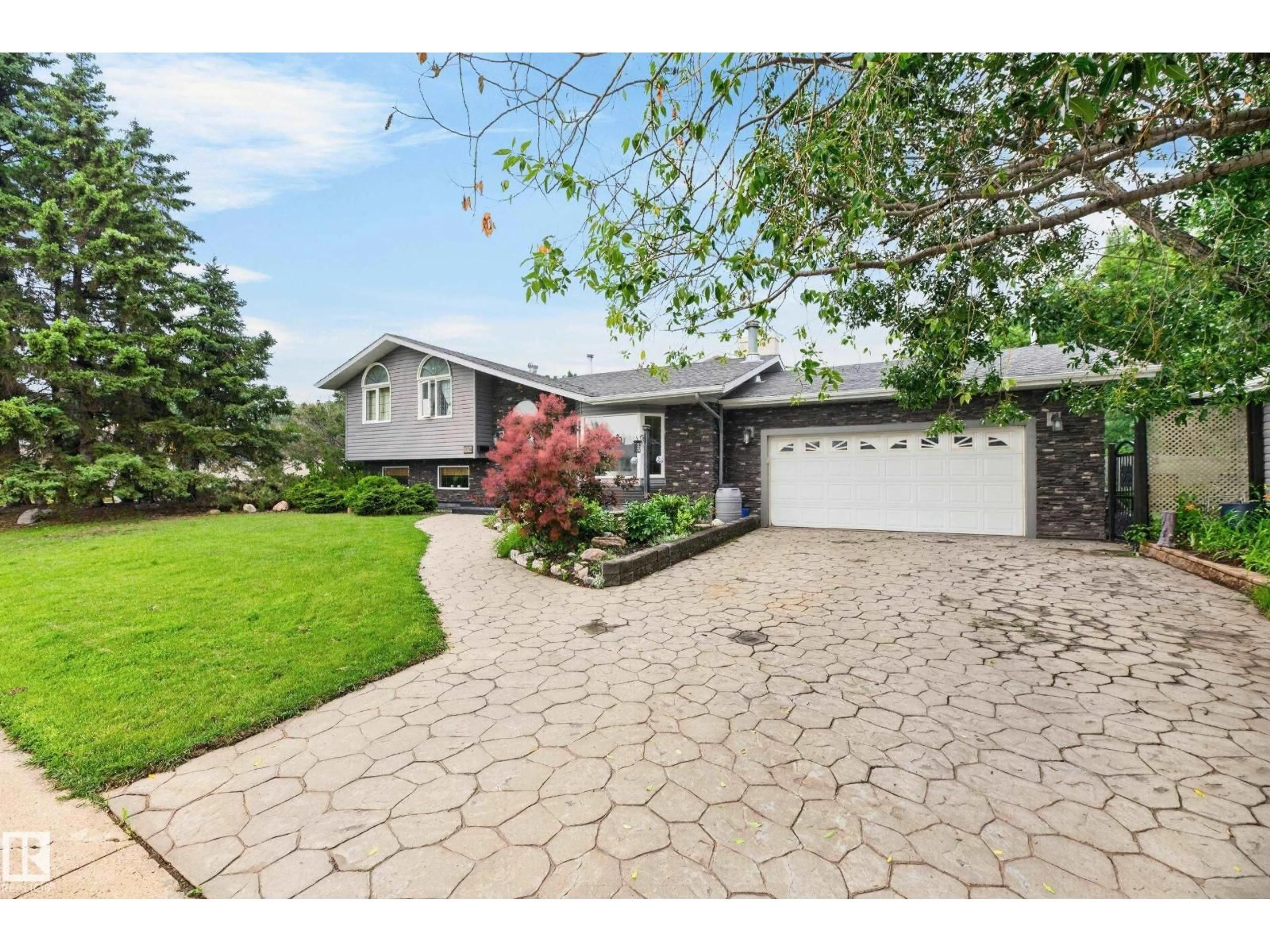 Home with vinyl exterior material, street for 13204 47 ST, Edmonton Alberta T5A3P6