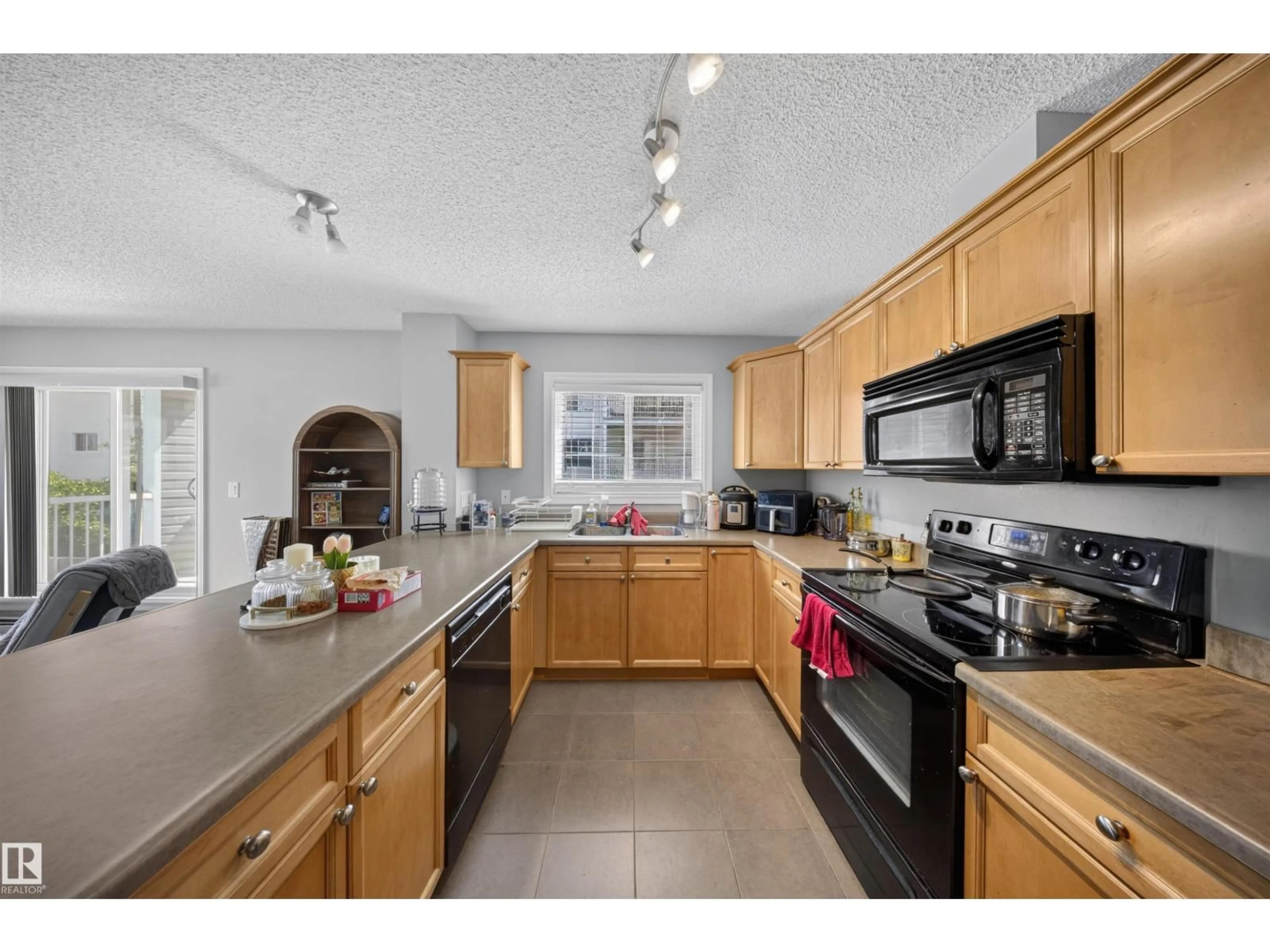 Standard kitchen, ceramic/tile floor for #215 - 4403 23 ST, Edmonton Alberta T6T0E4