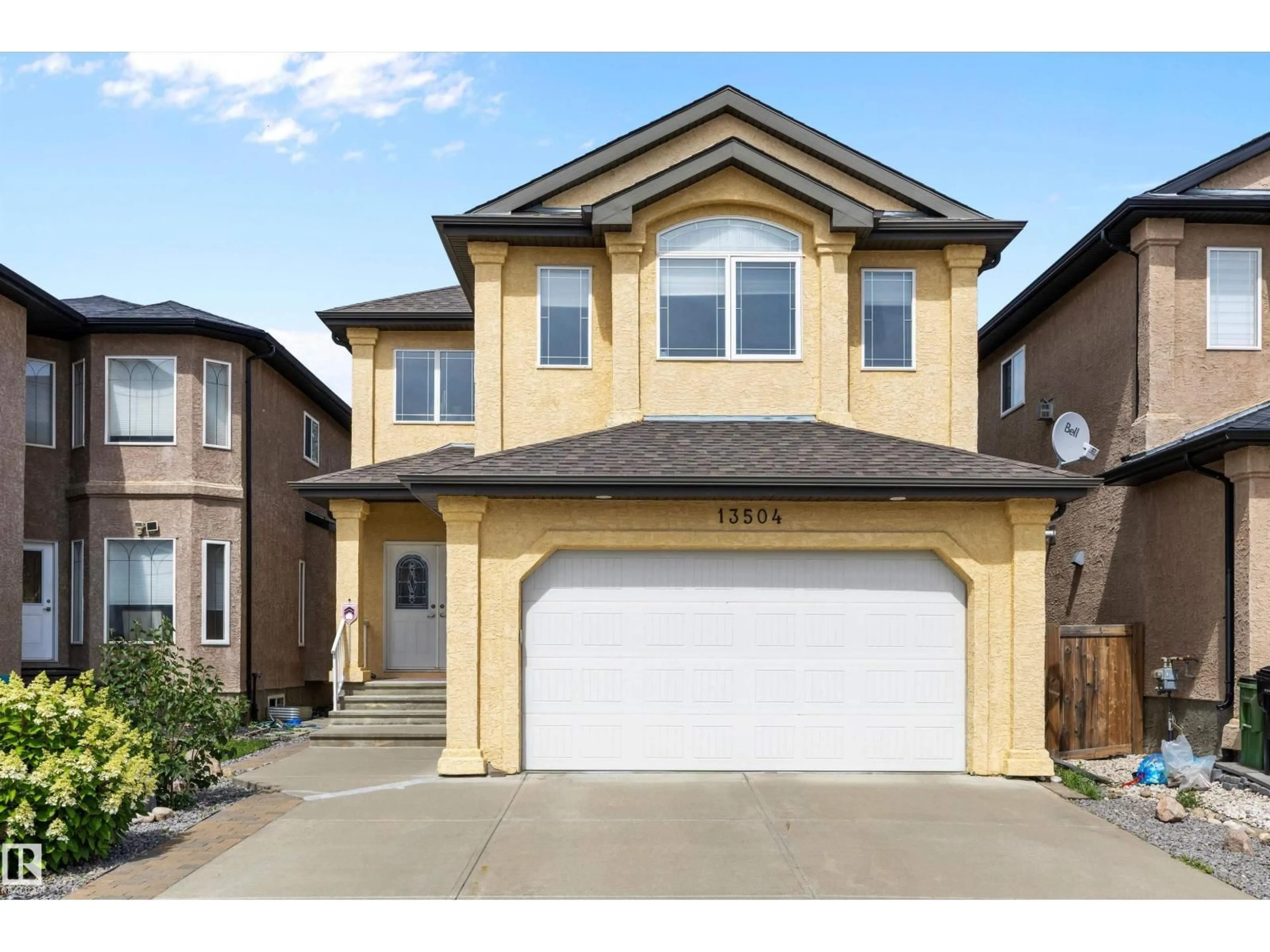 Home with vinyl exterior material, street for 13504 163 AV, Edmonton Alberta T6V0G3