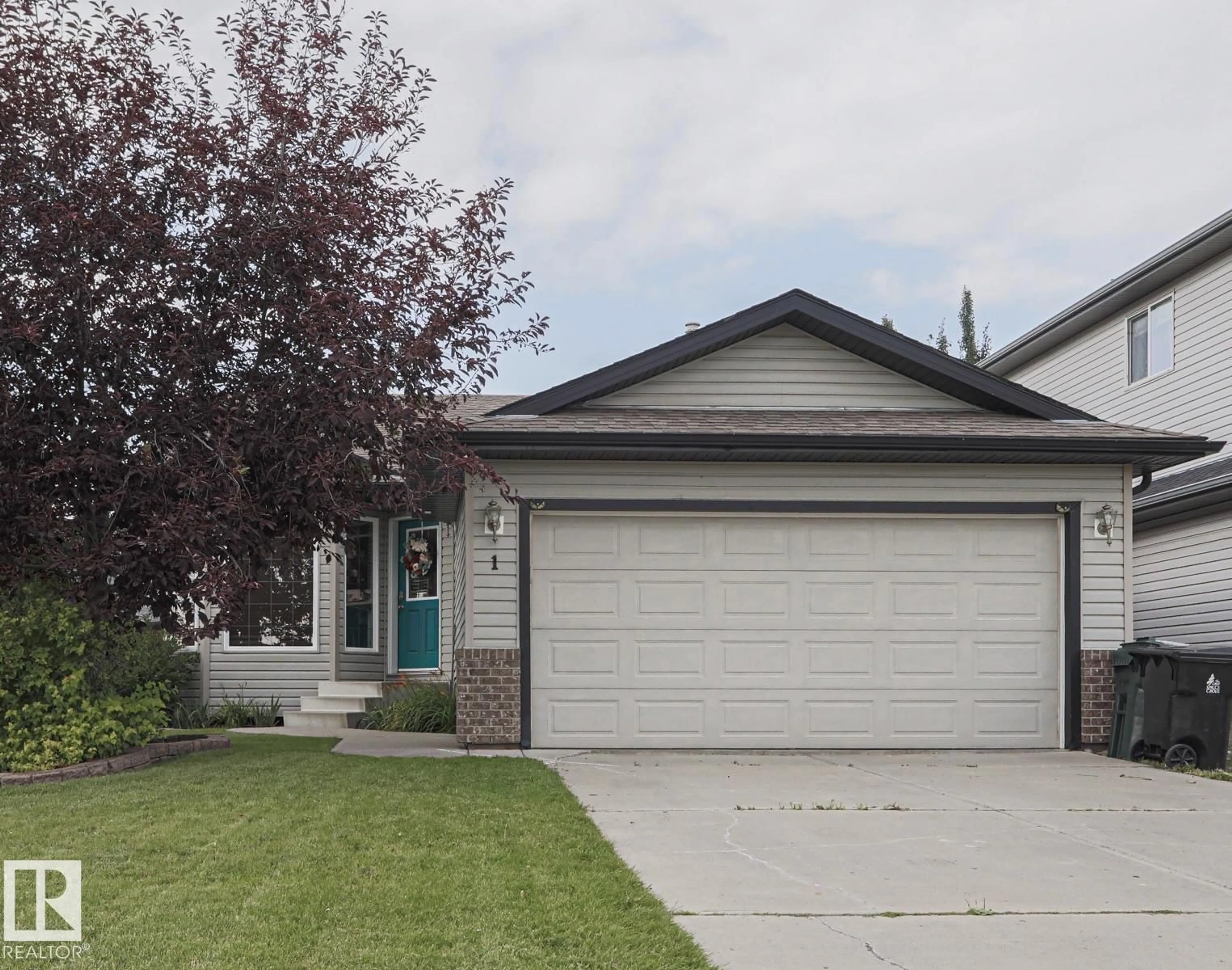 Home with vinyl exterior material, street for 1 LEYLAND WY, Spruce Grove Alberta T7X0A8