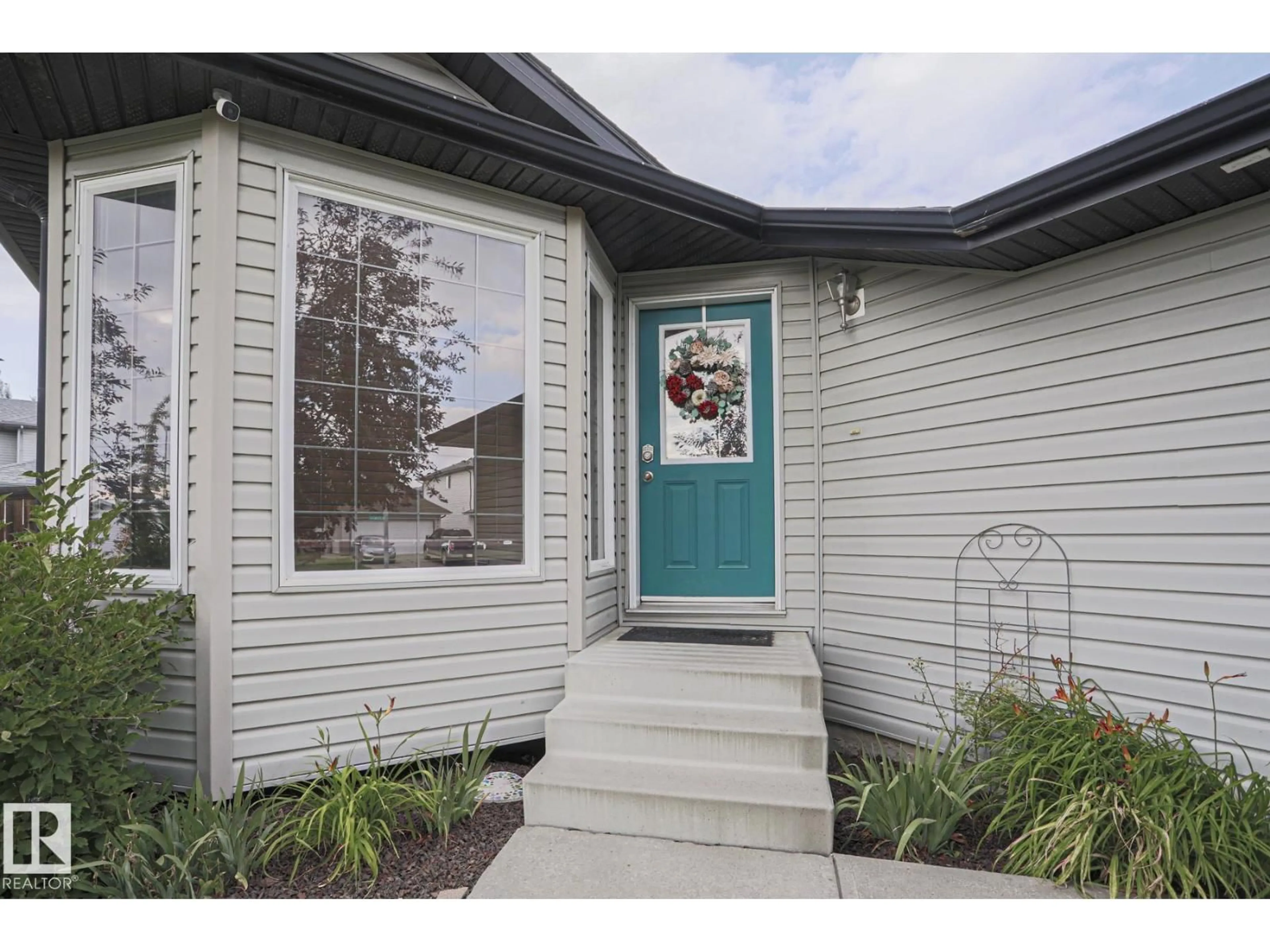 Home with vinyl exterior material, street for 1 LEYLAND WY, Spruce Grove Alberta T7X0A8