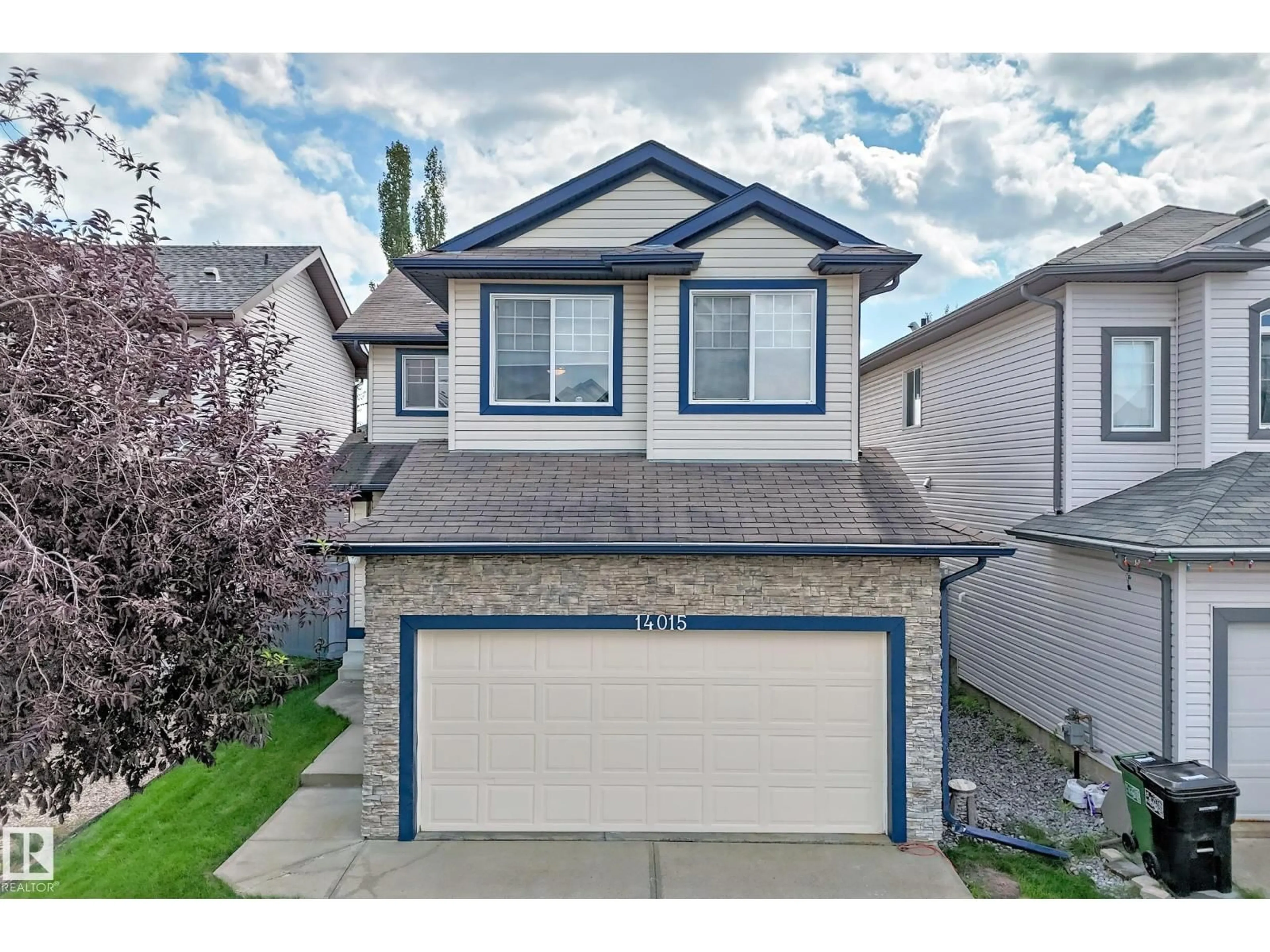 Home with vinyl exterior material, street for 14015 146 AV, Edmonton Alberta T6V1Y3