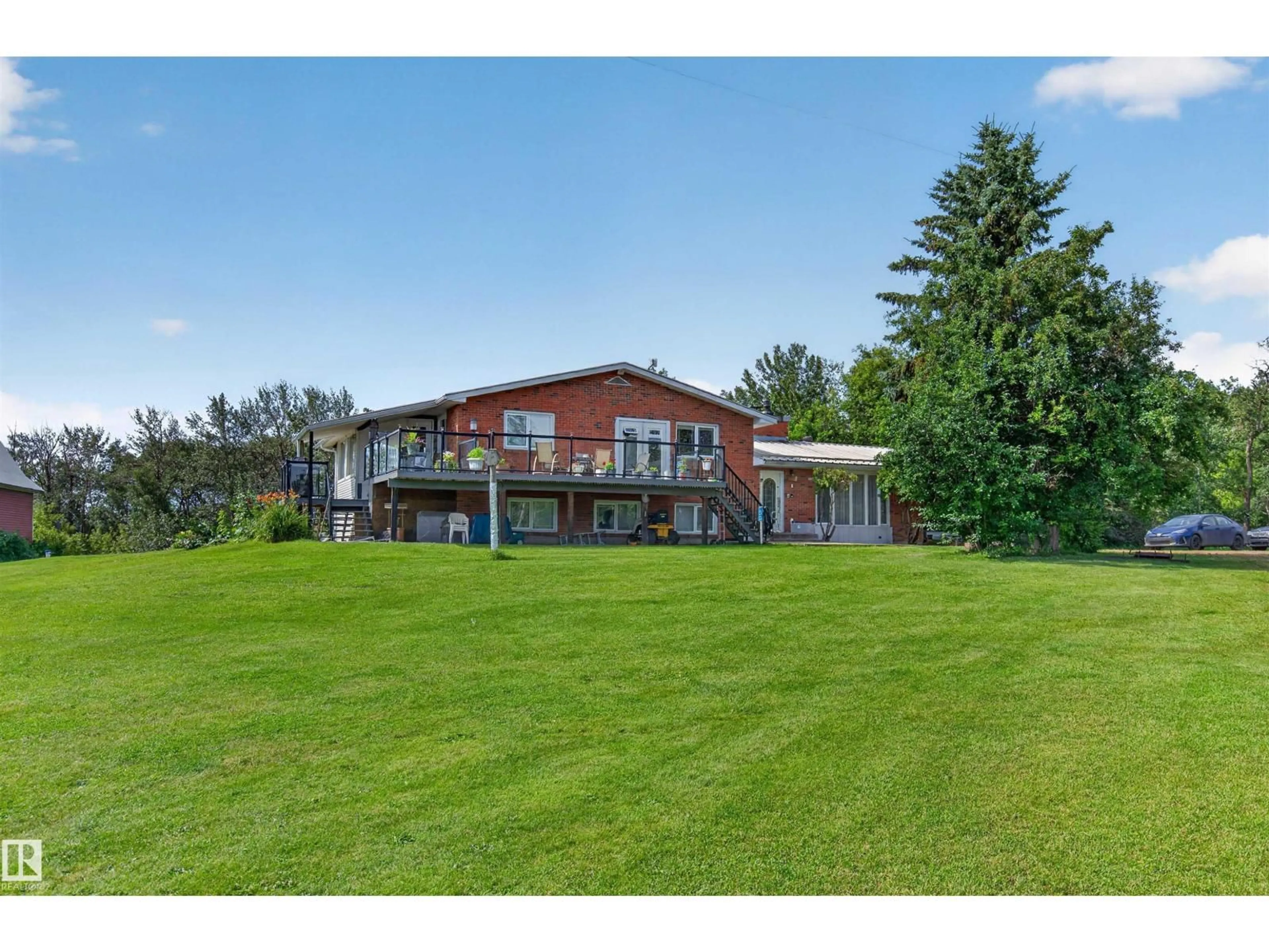 A pic from outside/outdoor area/front of a property/back of a property/a pic from drone, water/lake/river/ocean view for 56505 RGE ROAD 233, Rural Sturgeon County Alberta T0A1N4