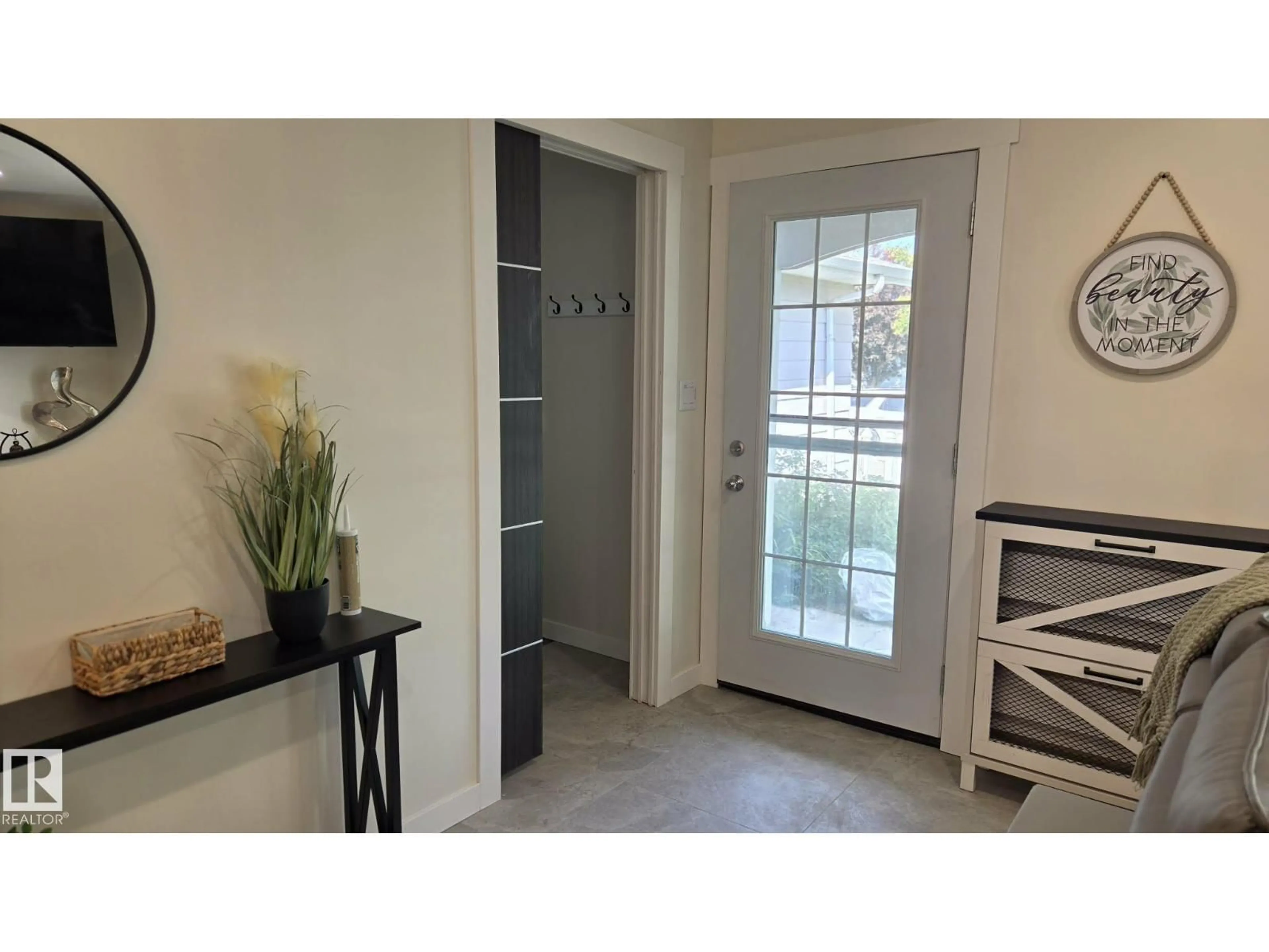 Indoor entryway for 3508 106A ST NW, Edmonton Alberta T6J1A8