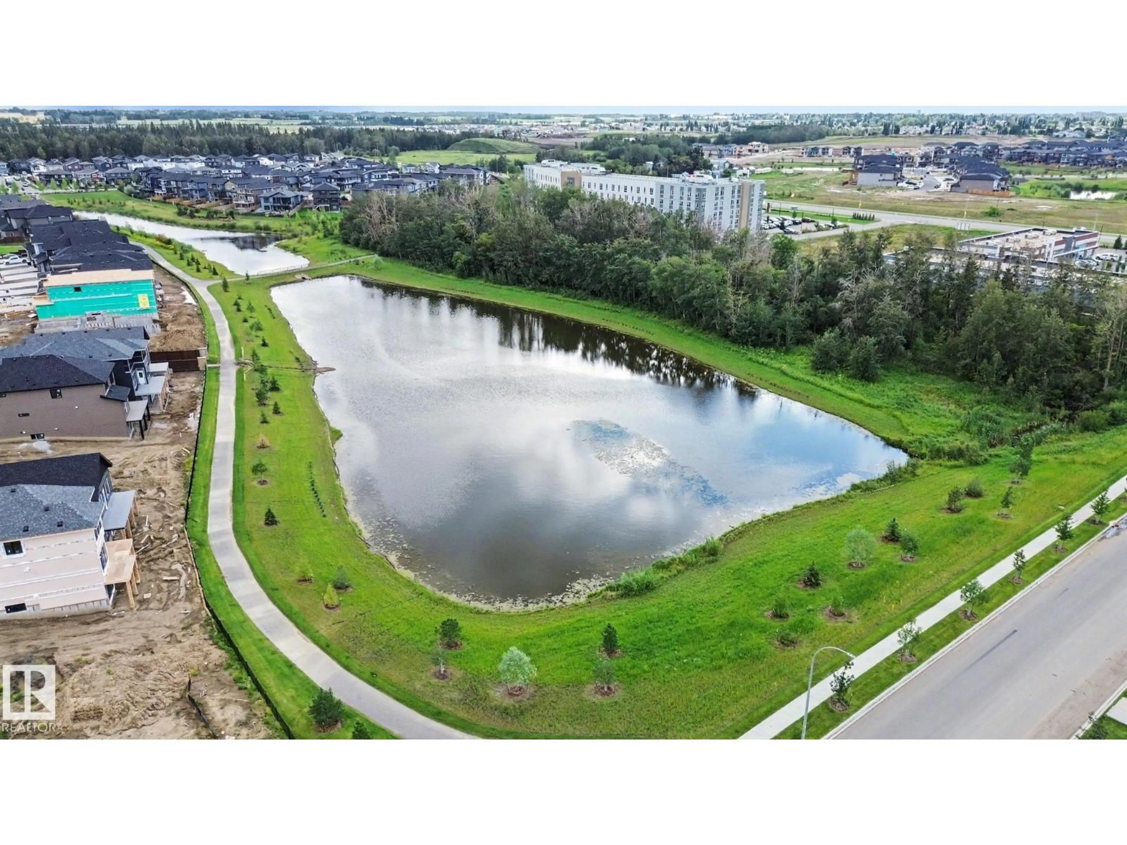 A pic from outside/outdoor area/front of a property/back of a property/a pic from drone, water/lake/river/ocean view for 11 PIERWYCK LO, Spruce Grove Alberta T7X3H1