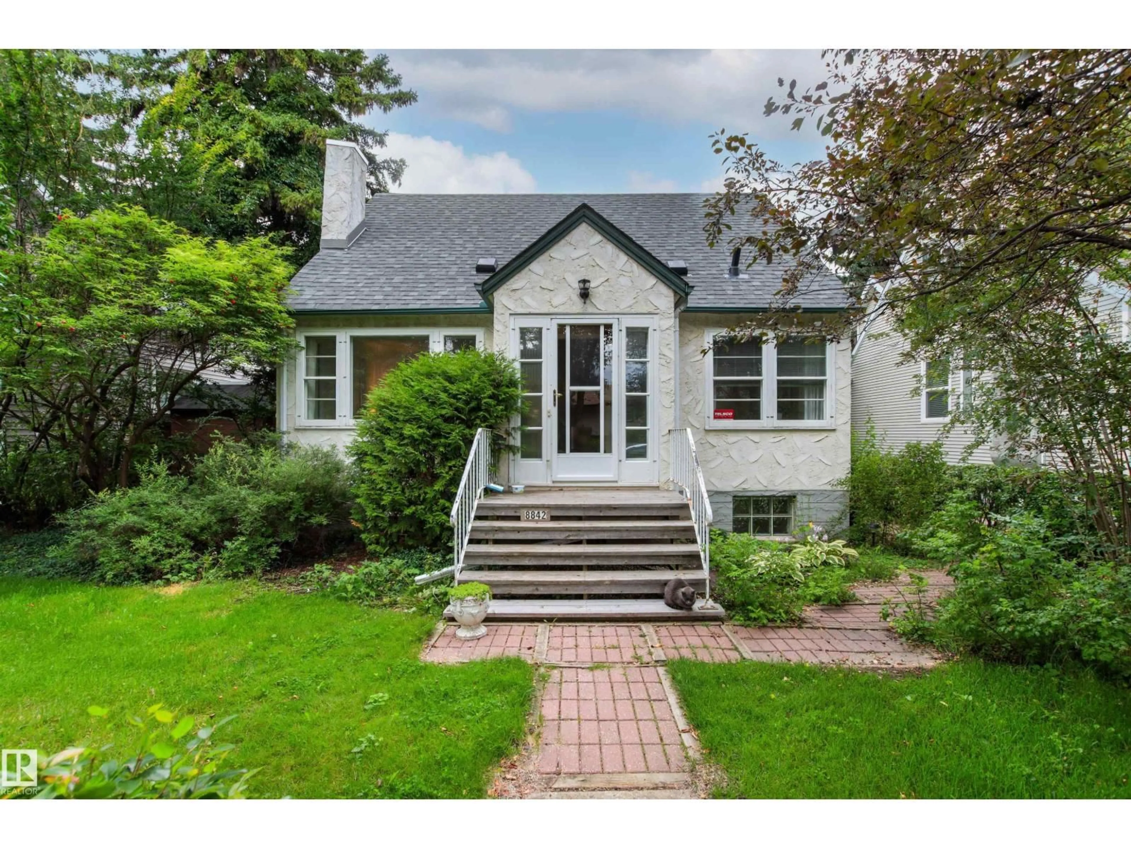 Home with brick exterior material, street for 8842 89 ST, Edmonton Alberta T6C3K6