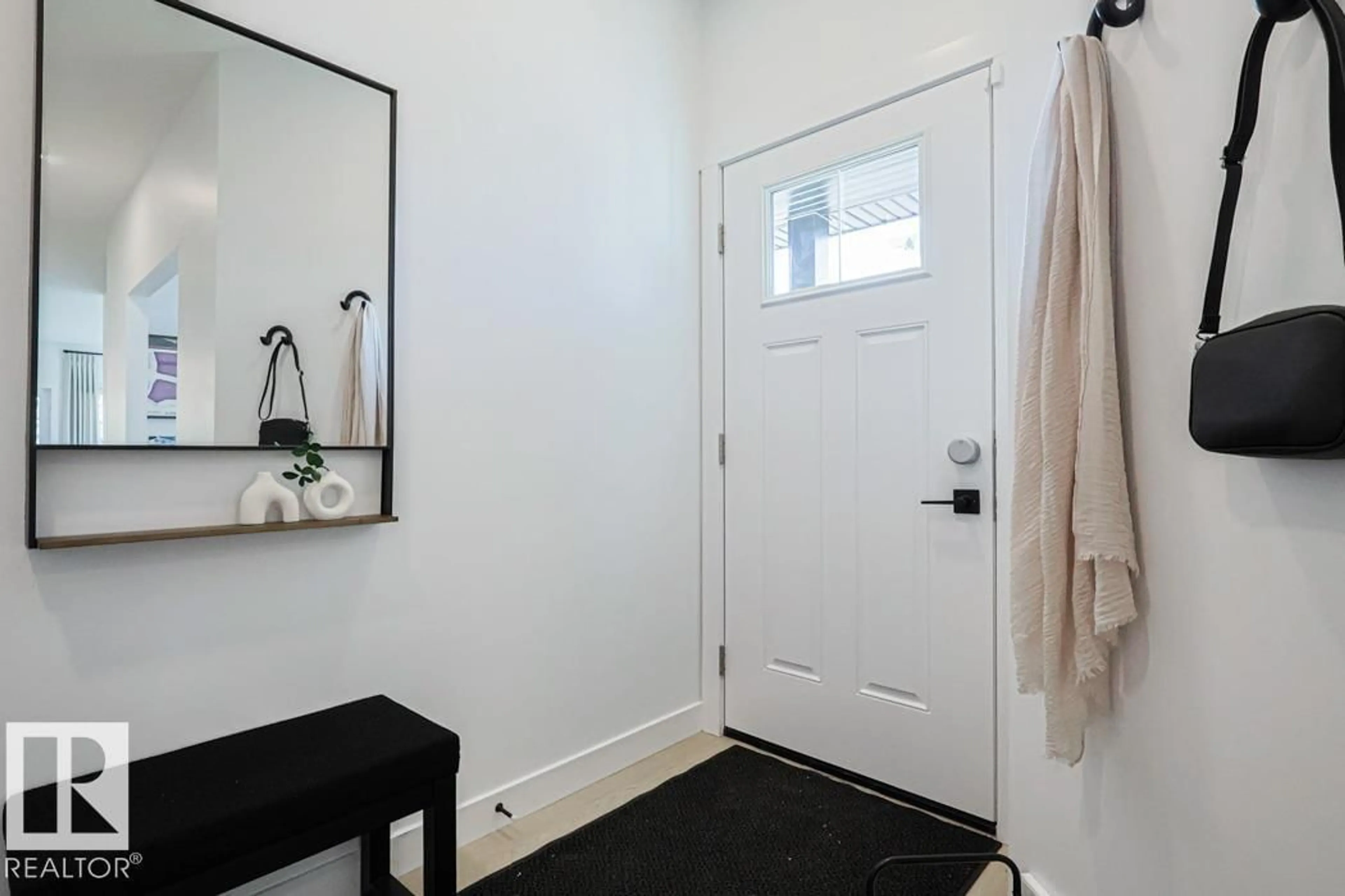 Indoor entryway for 18651 19 AV, Edmonton Alberta T6M3M9