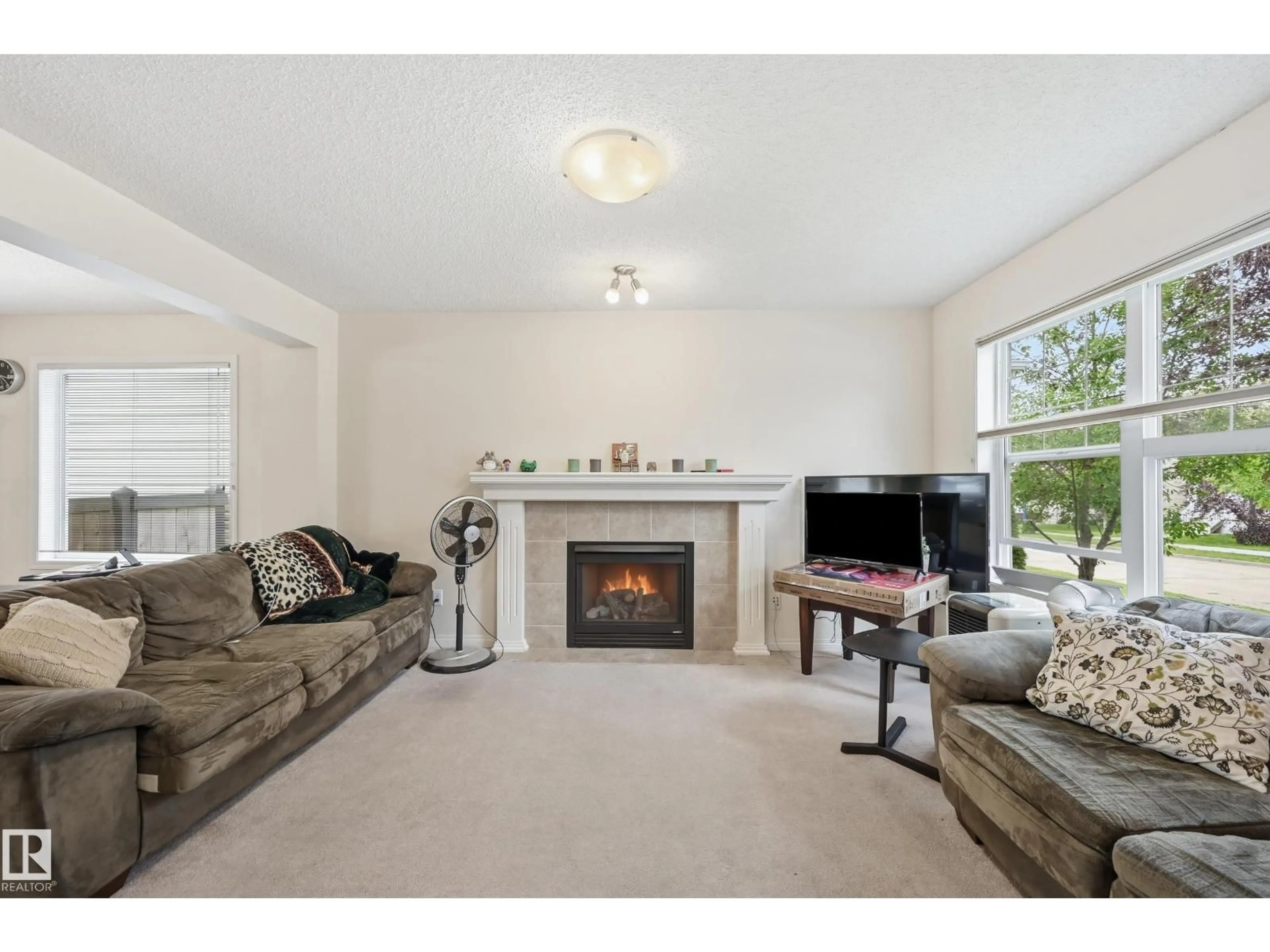 Living room with furniture, unknown for 1516 76 ST, Edmonton Alberta T6X1M3