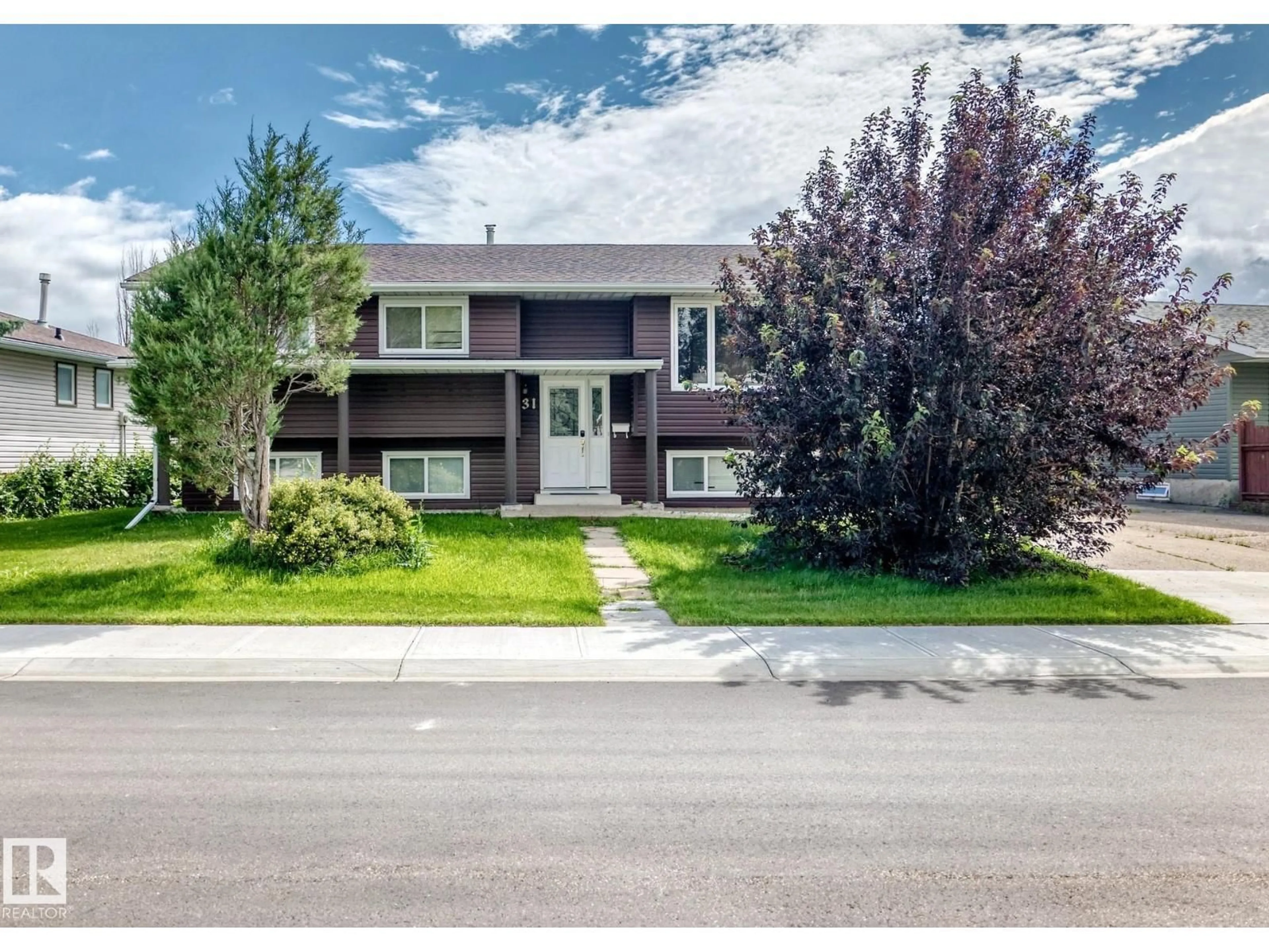 Home with vinyl exterior material, street for 31 HUGHES RD, Edmonton Alberta T5A4E1