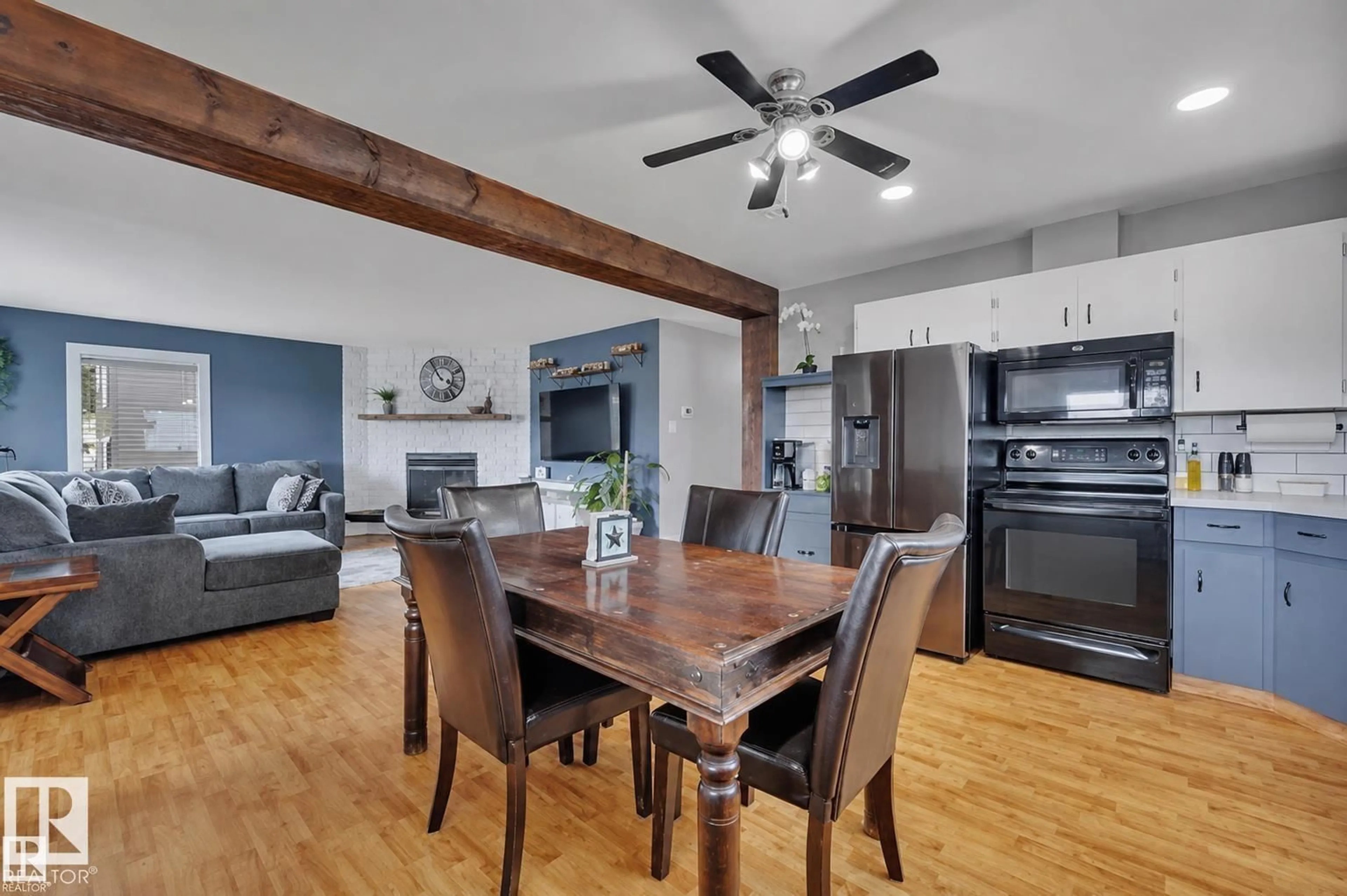 Open concept kitchen, wood/laminate floor for 5116 47 AV, Leduc Alberta T9E5C5
