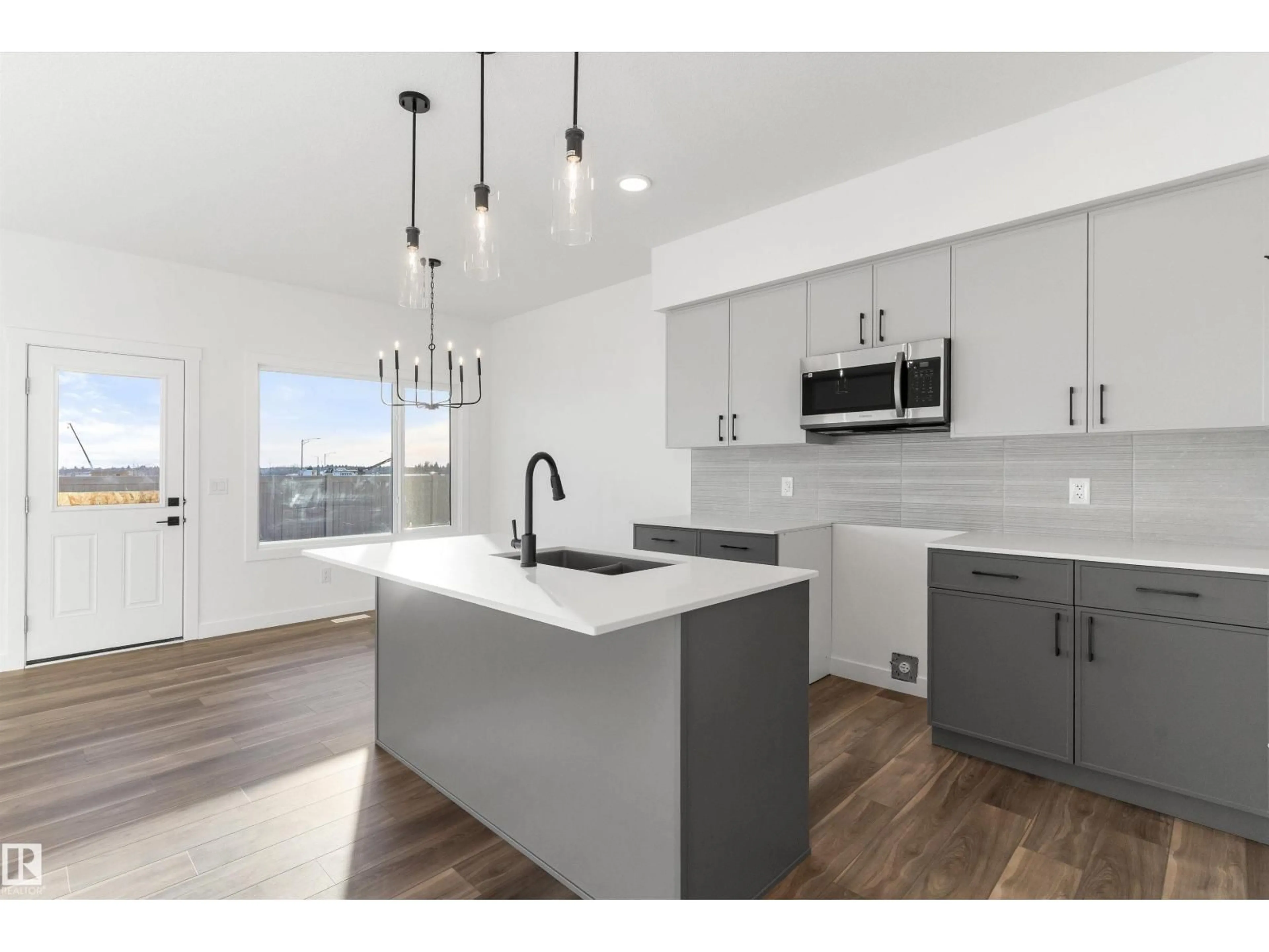 Open concept kitchen, unknown for NW - 19107 20 AV, Edmonton Alberta T6M3E8