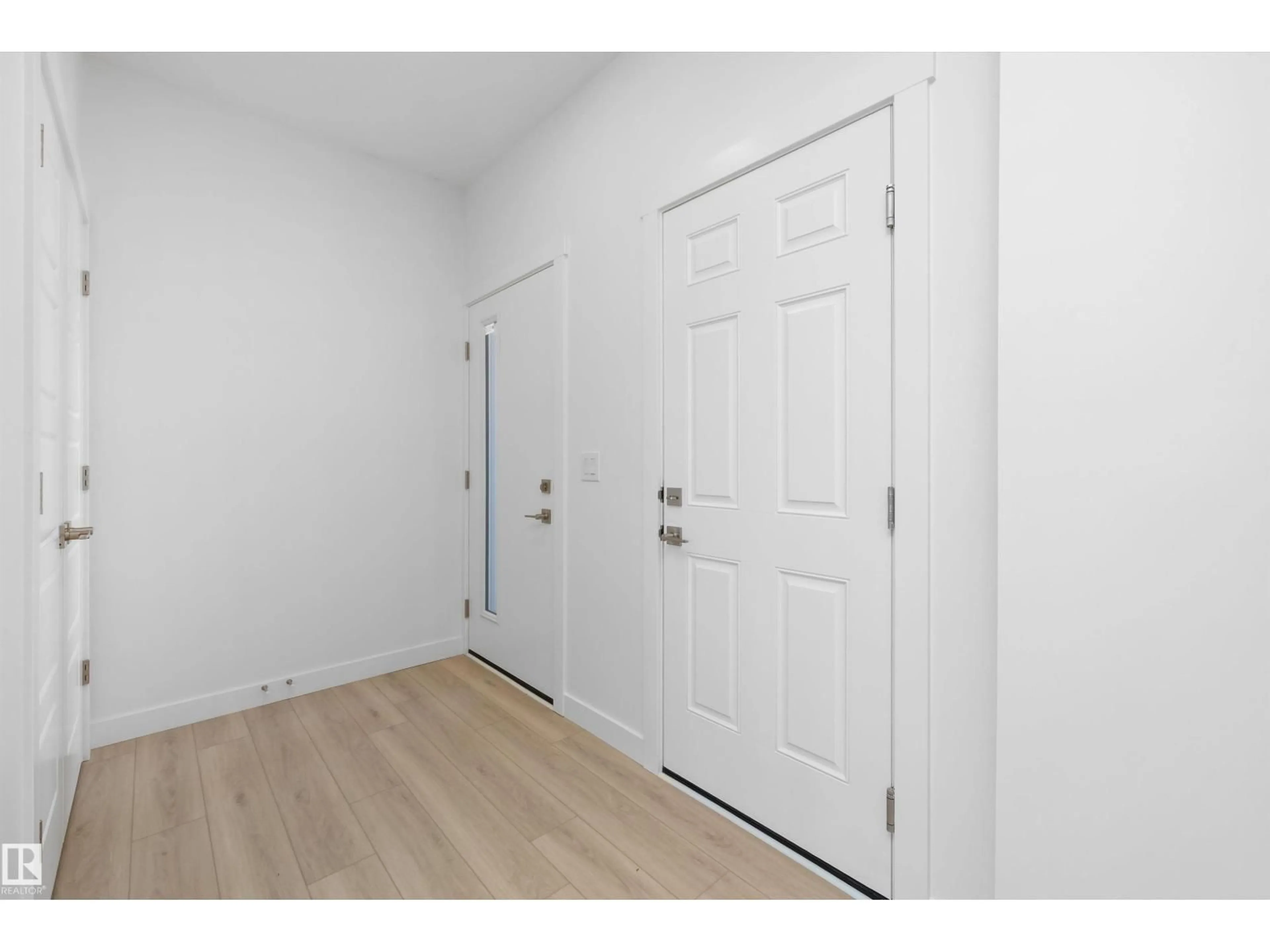 Indoor entryway for 18923 28 AV, Edmonton Alberta T6M3H9