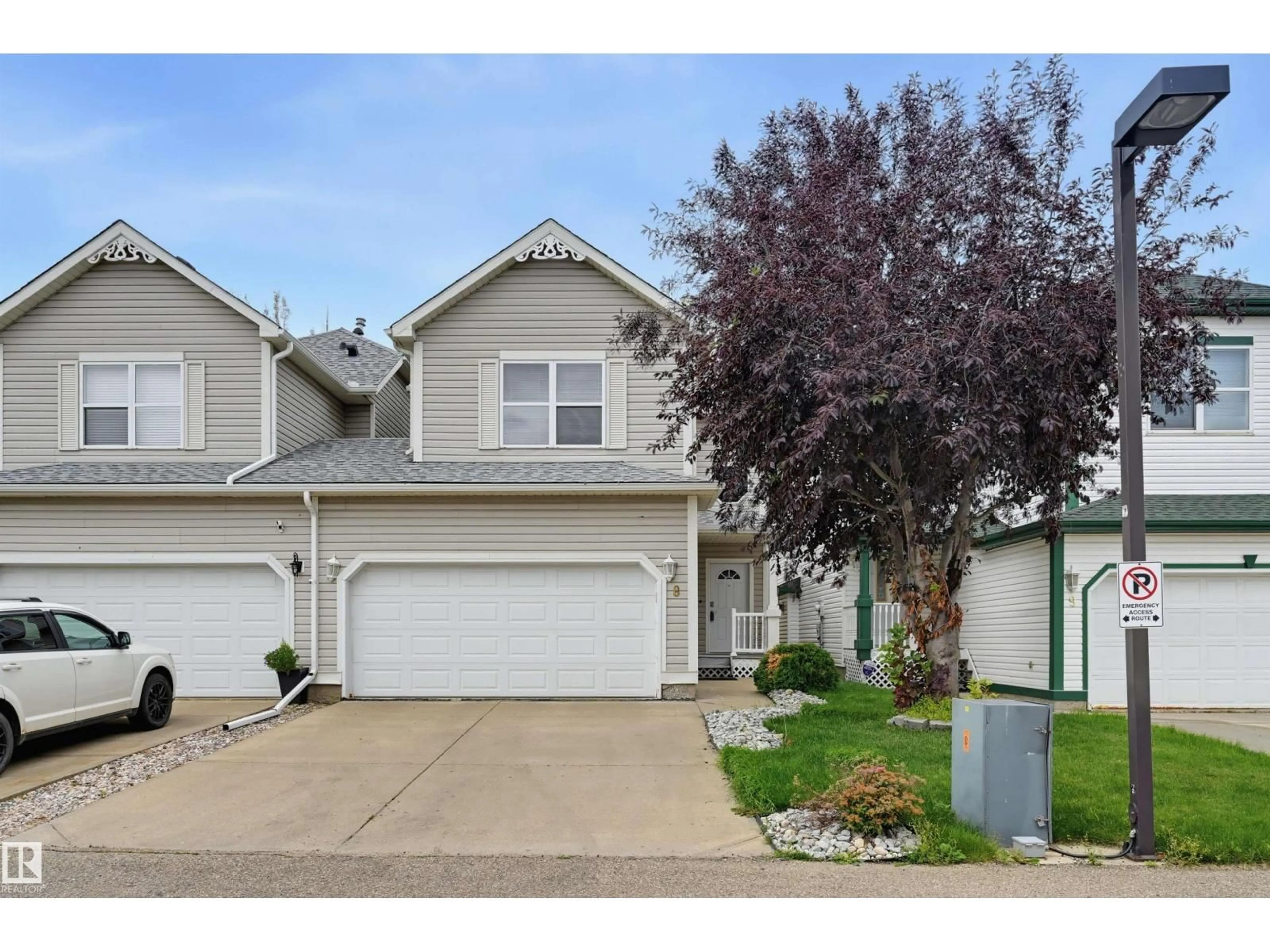 Home with vinyl exterior material, street for #8 - 1920 MILLWOODS RD, Edmonton Alberta T6L7C7