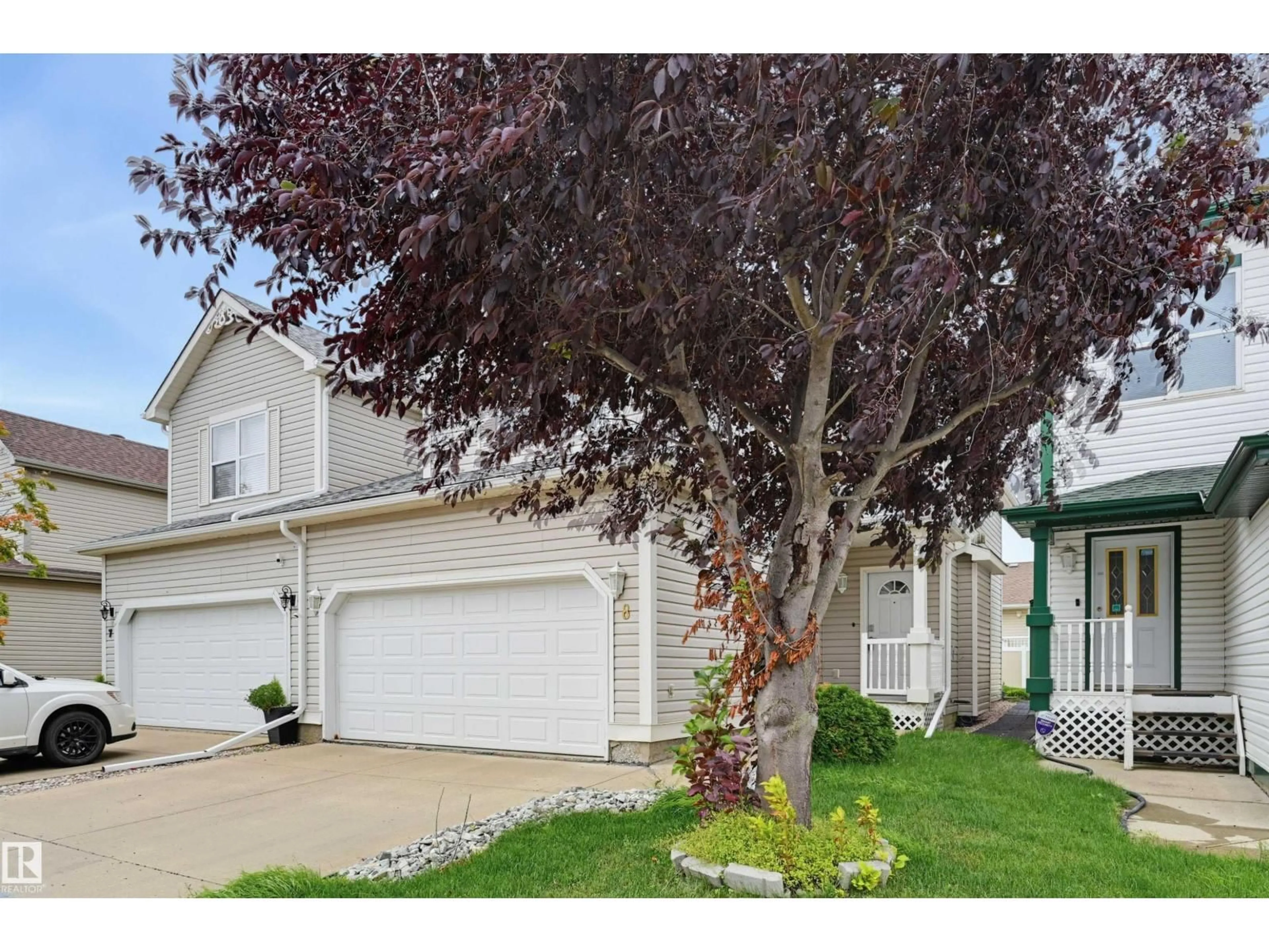 Home with vinyl exterior material, street for #8 - 1920 MILLWOODS RD, Edmonton Alberta T6L7C7