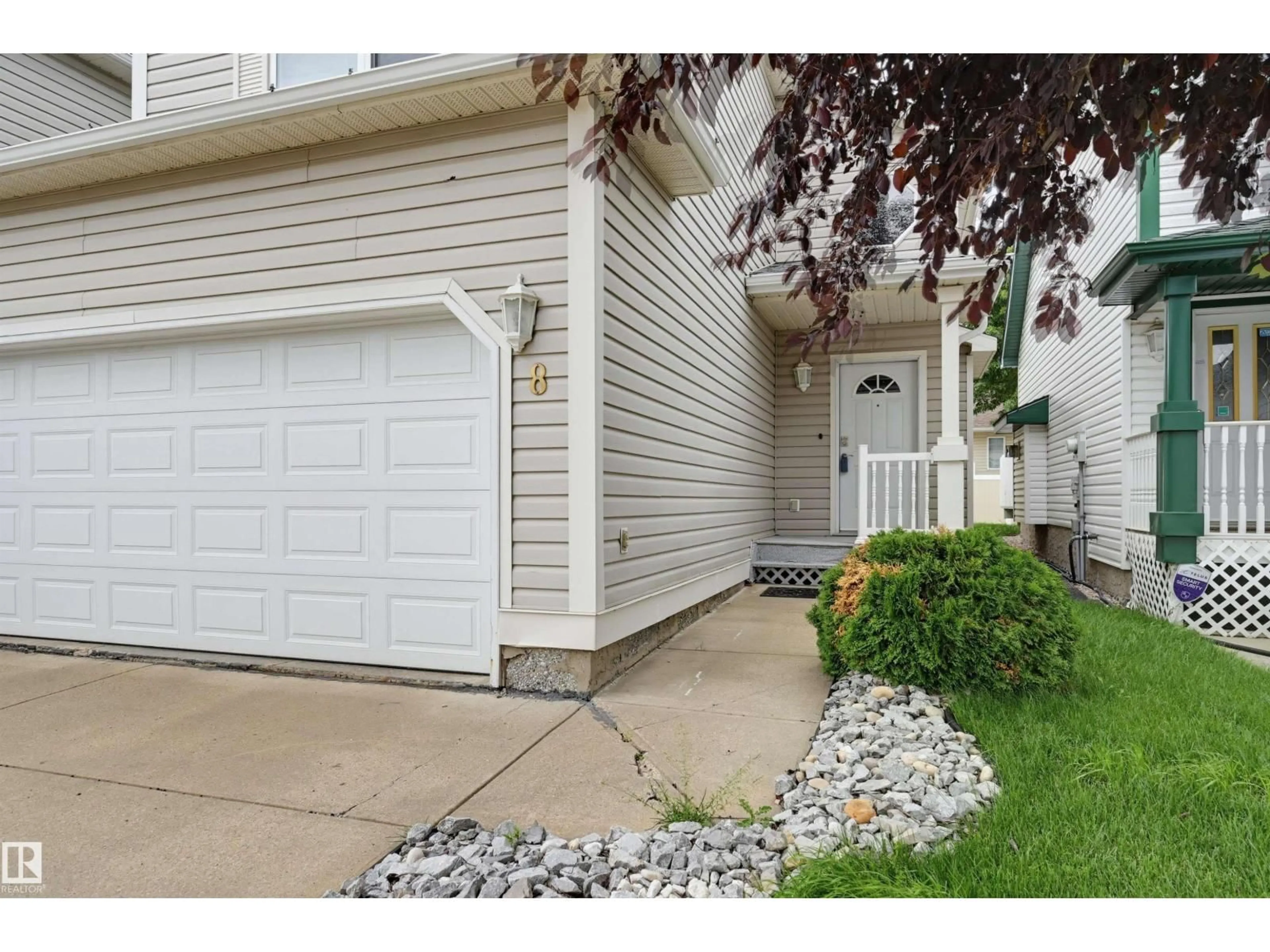 Home with vinyl exterior material, street for #8 - 1920 MILLWOODS RD, Edmonton Alberta T6L7C7