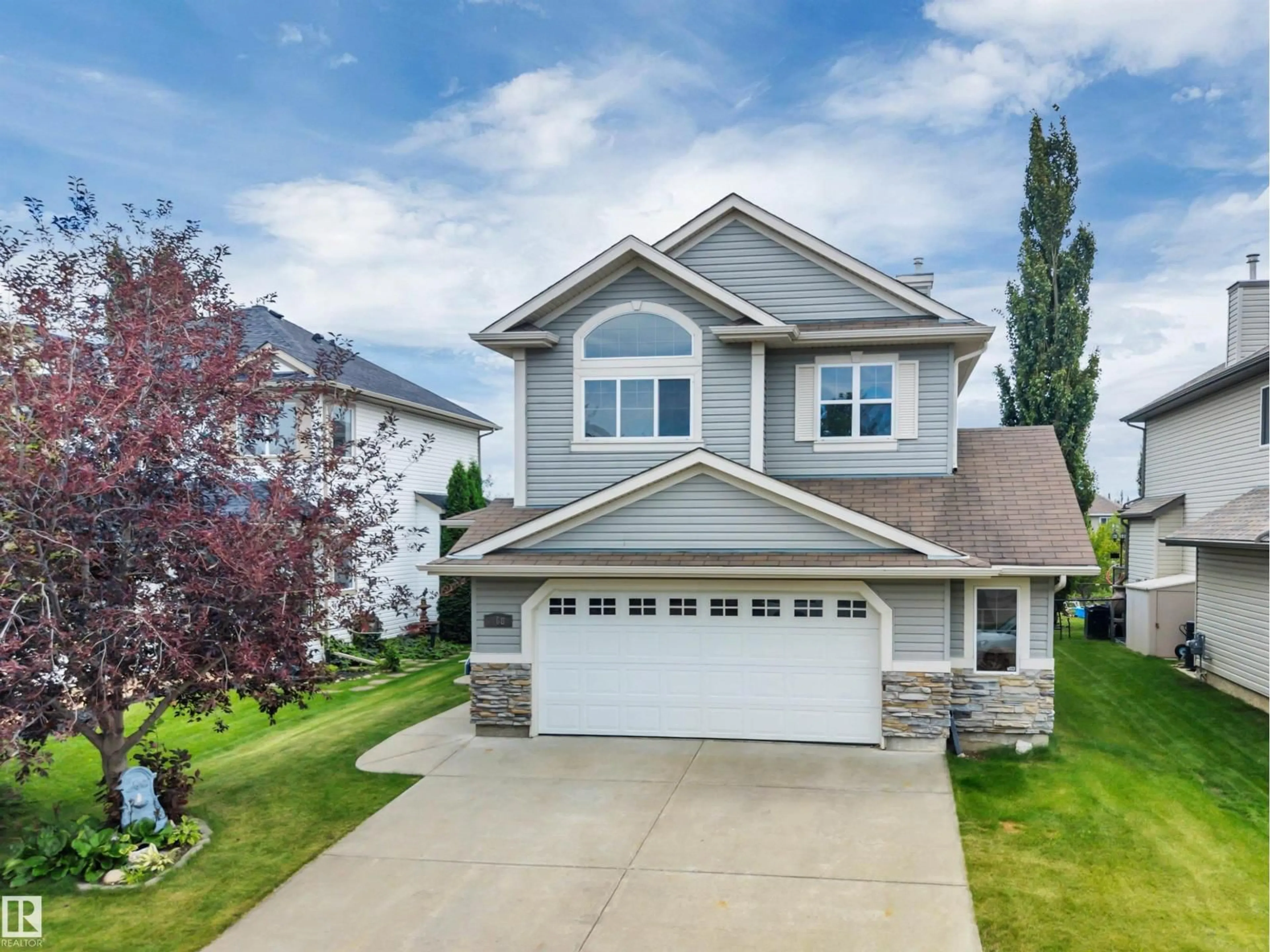 Home with vinyl exterior material, street for 168 RUE MASSON, Beaumont Alberta T4X1W3