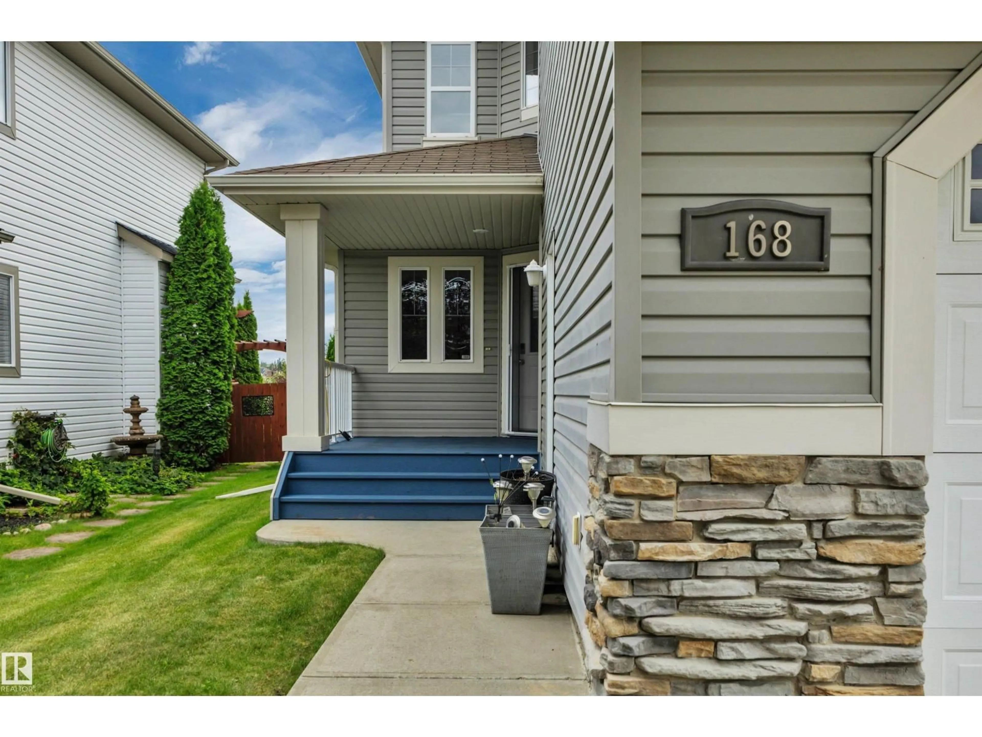 Home with vinyl exterior material, street for 168 RUE MASSON, Beaumont Alberta T4X1W3