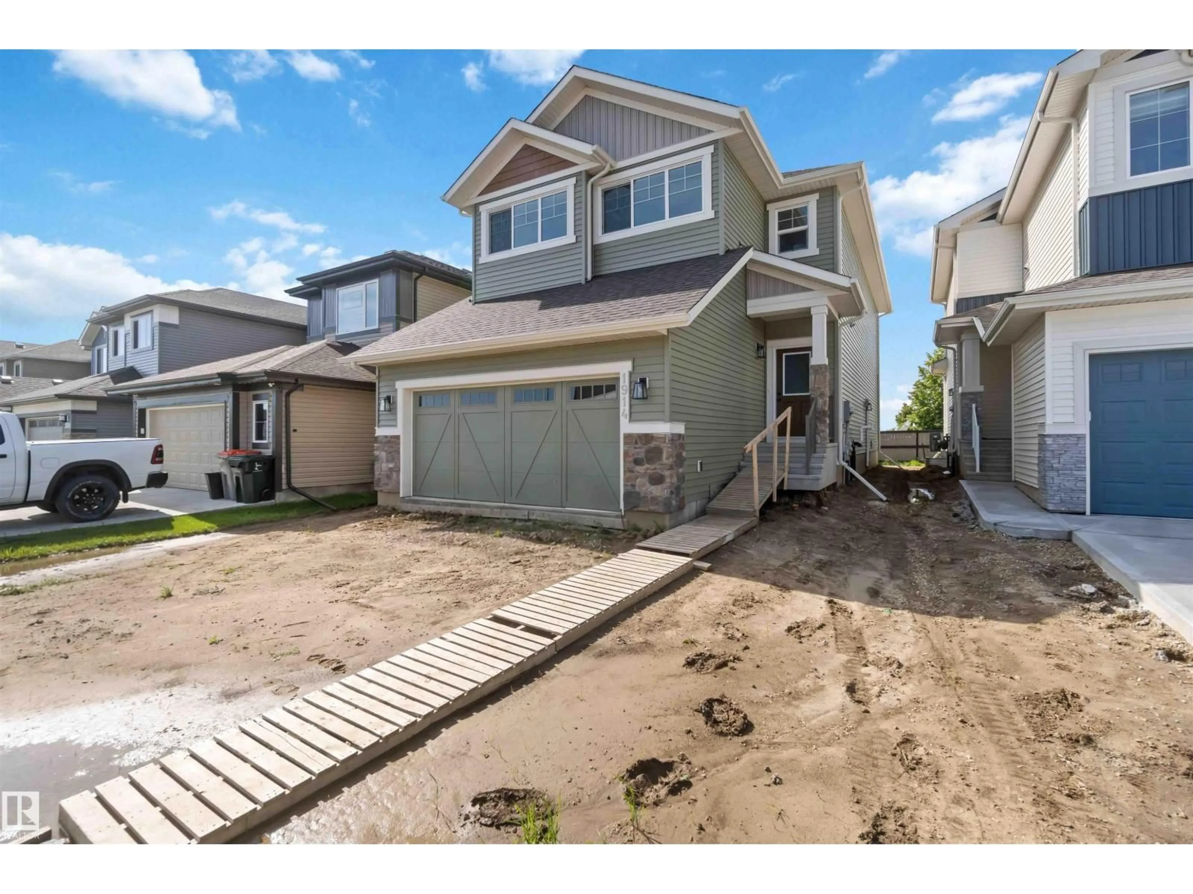 Home with vinyl exterior material, street for 1914 WESTERRA LN, Stony Plain Alberta T7Z0L3