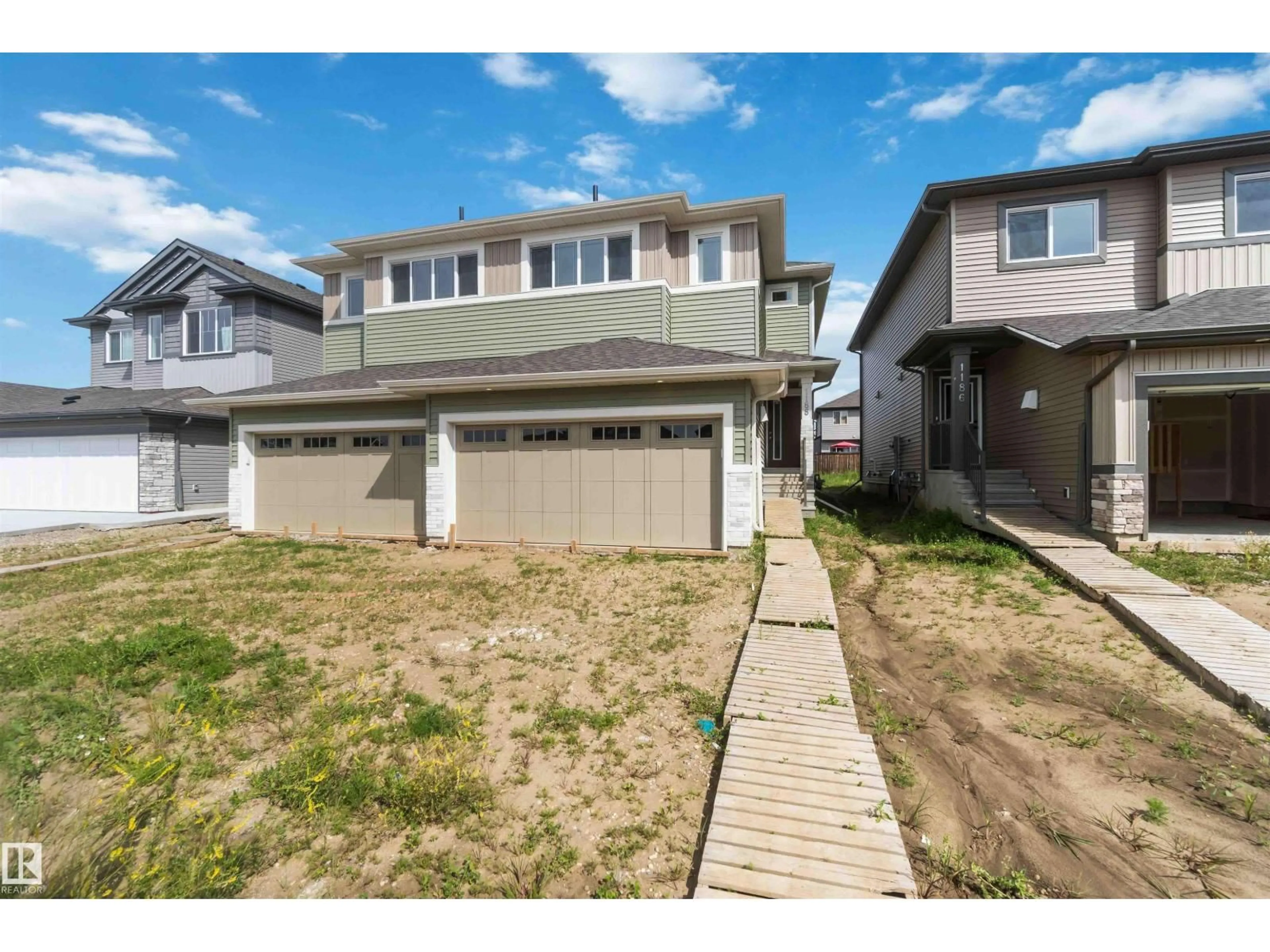 Home with vinyl exterior material, street for 1188 SOUTH CREEK WD, Stony Plain Alberta T7Z0P5