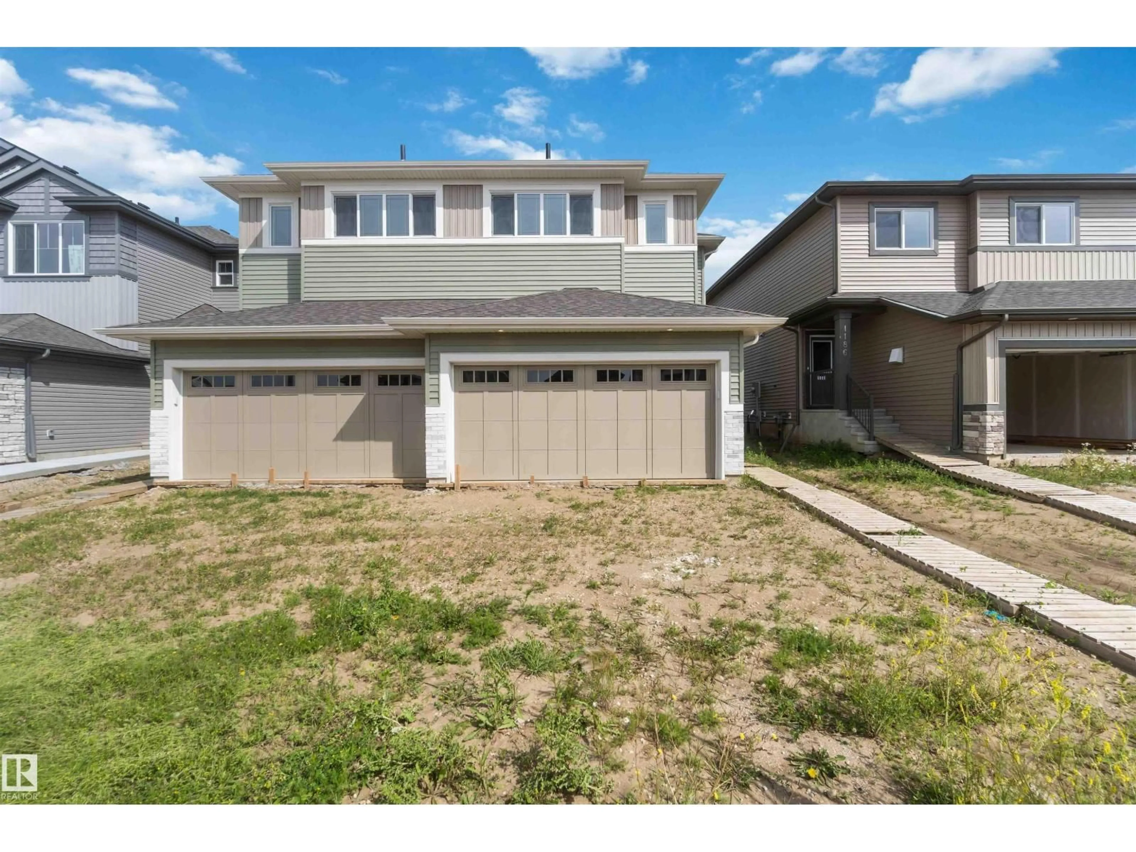 Home with vinyl exterior material, street for 1188 SOUTH CREEK WD, Stony Plain Alberta T7Z0P5