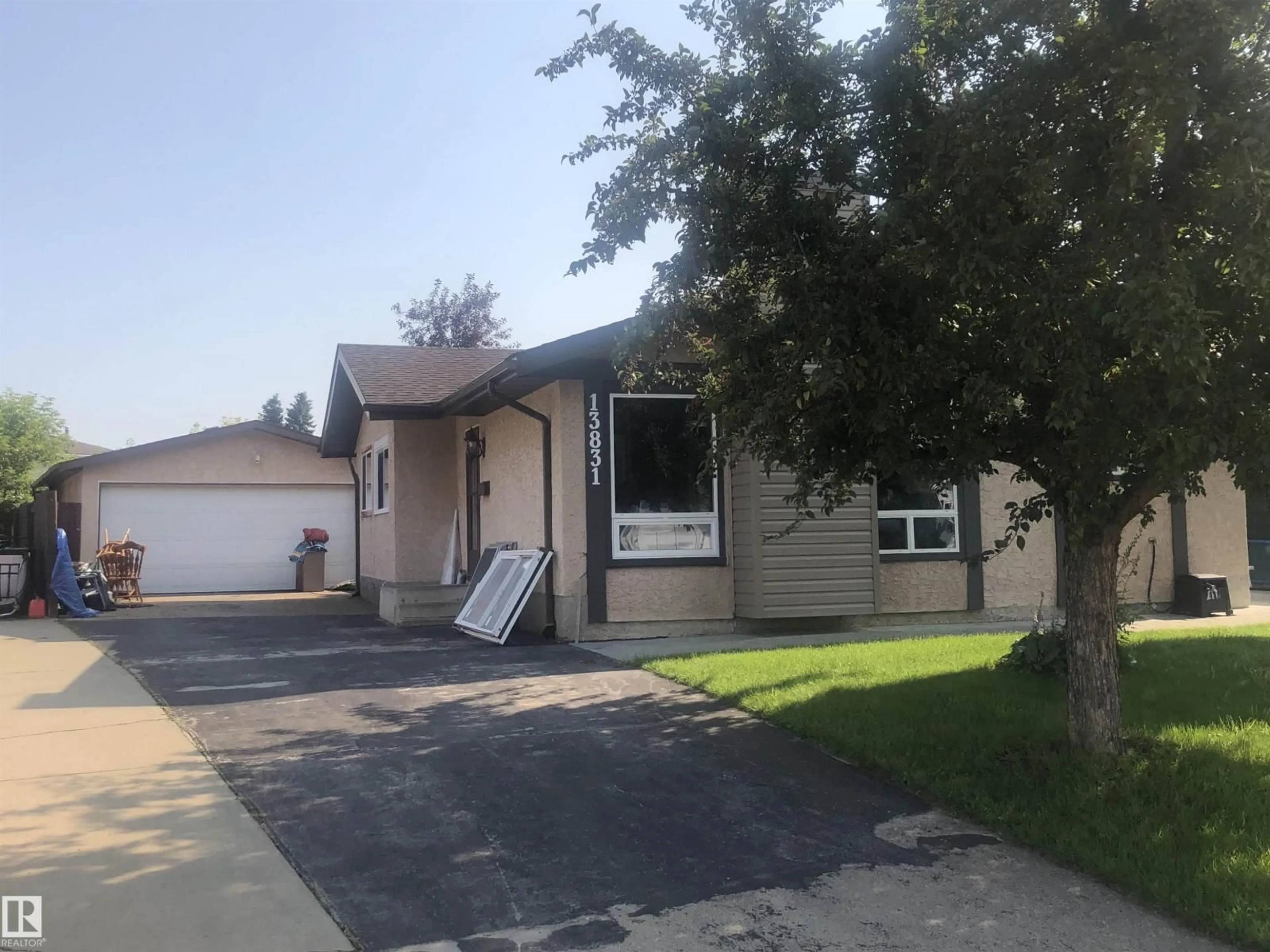 Home with vinyl exterior material, street for NW - 13831 23 ST, Edmonton Alberta T5Y1C1