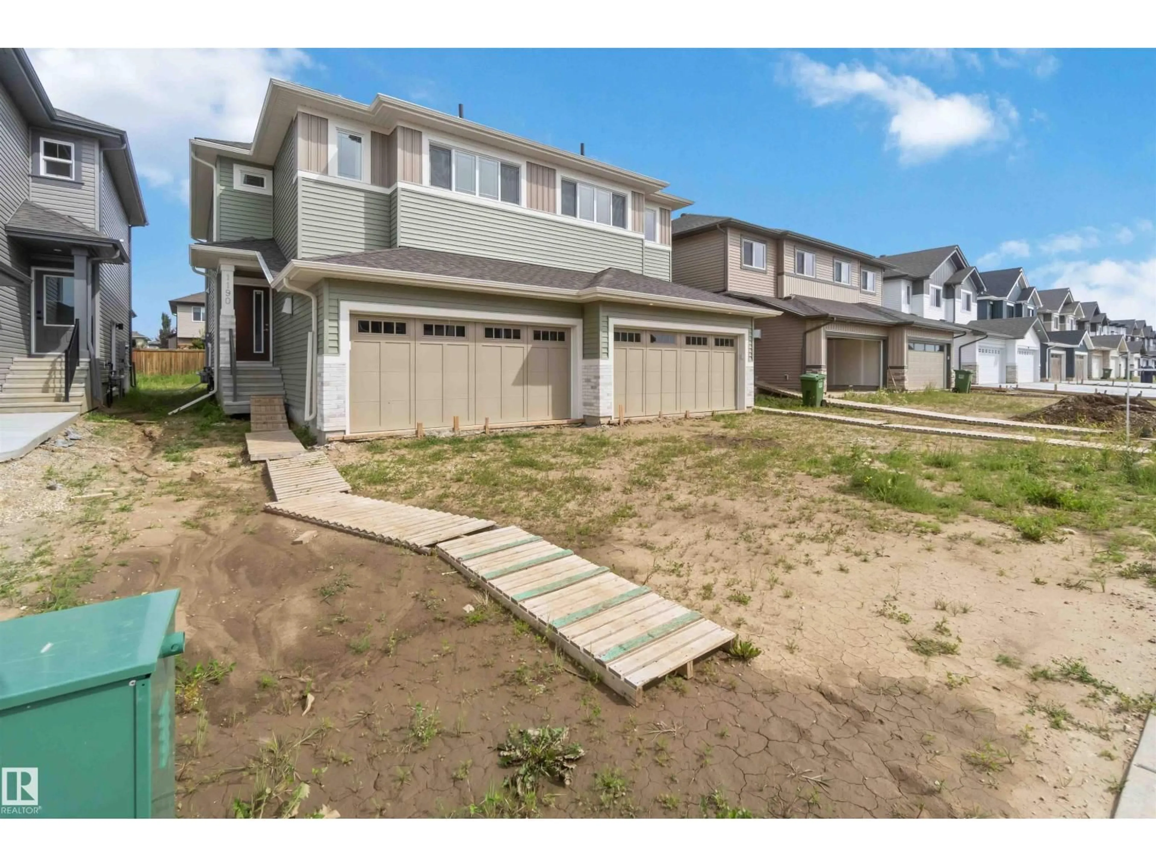A pic from outside/outdoor area/front of a property/back of a property/a pic from drone, street for 1190 SOUTH CREEK WD, Stony Plain Alberta T7Z0P5