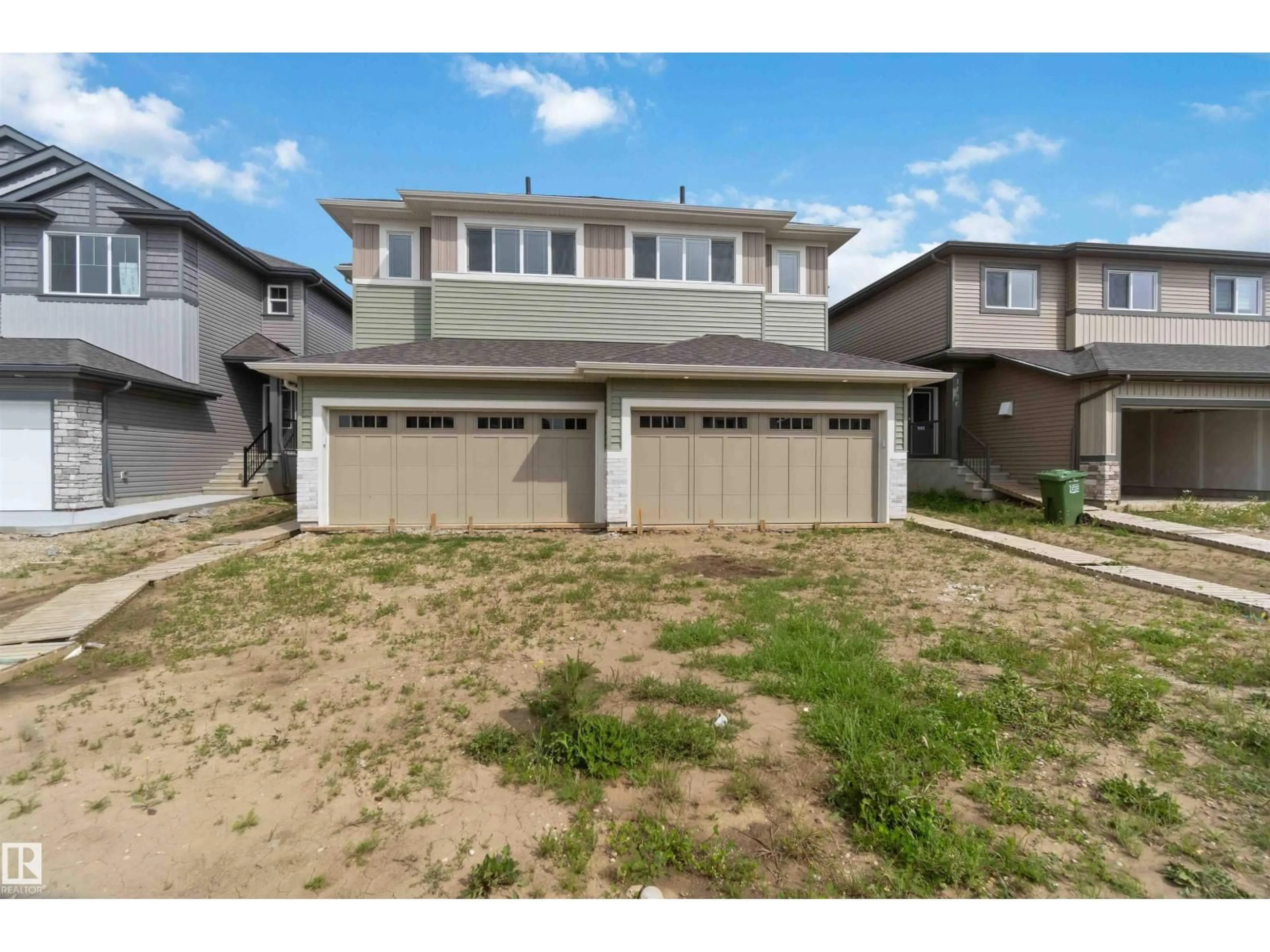 A pic from outside/outdoor area/front of a property/back of a property/a pic from drone, street for 1190 SOUTH CREEK WD, Stony Plain Alberta T7Z0P5
