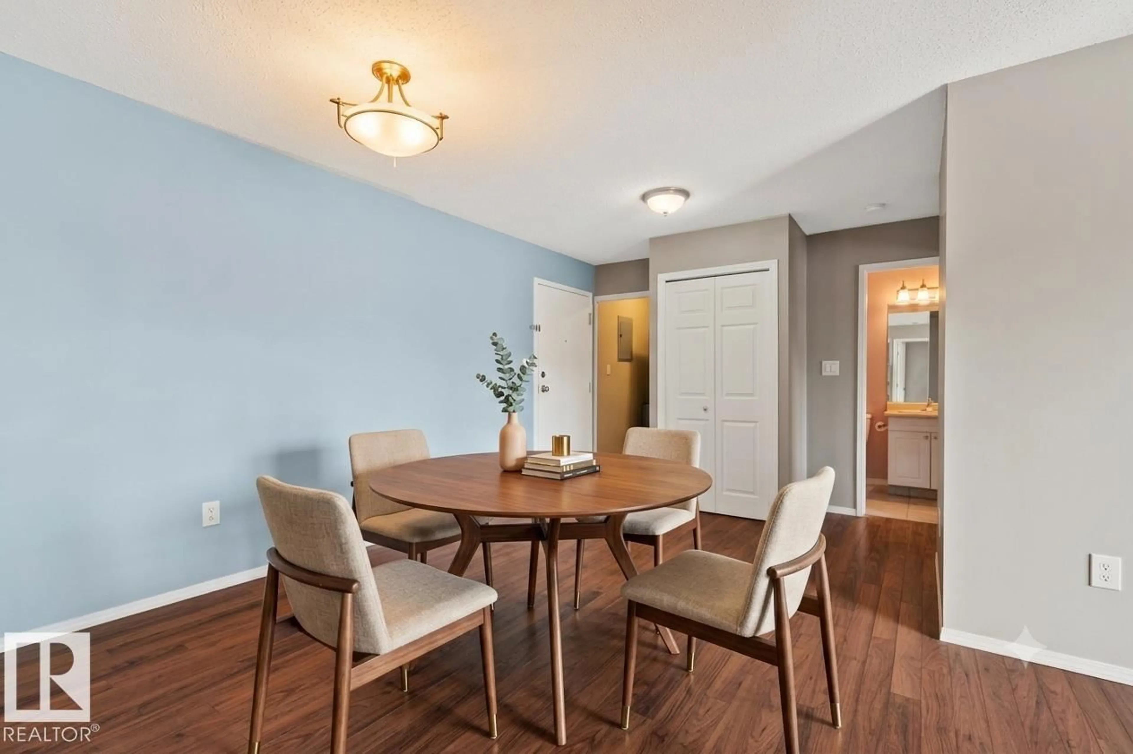 Dining room, wood/laminate floor for #210 - 2508 50 ST, Edmonton Alberta T6L6X9