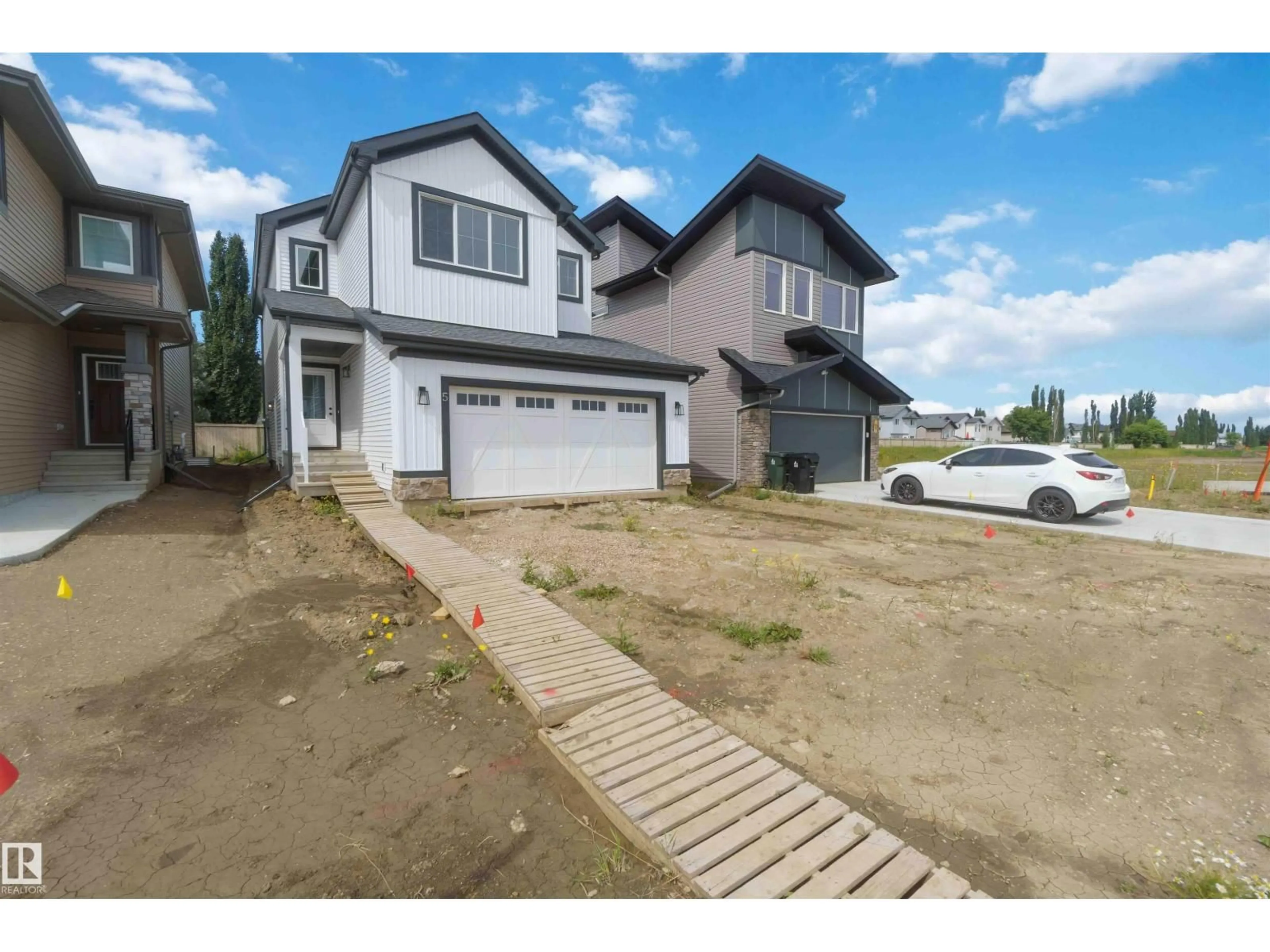 A pic from outside/outdoor area/front of a property/back of a property/a pic from drone, street for 5 EMERSON LD, Spruce Grove Alberta T7X4G9