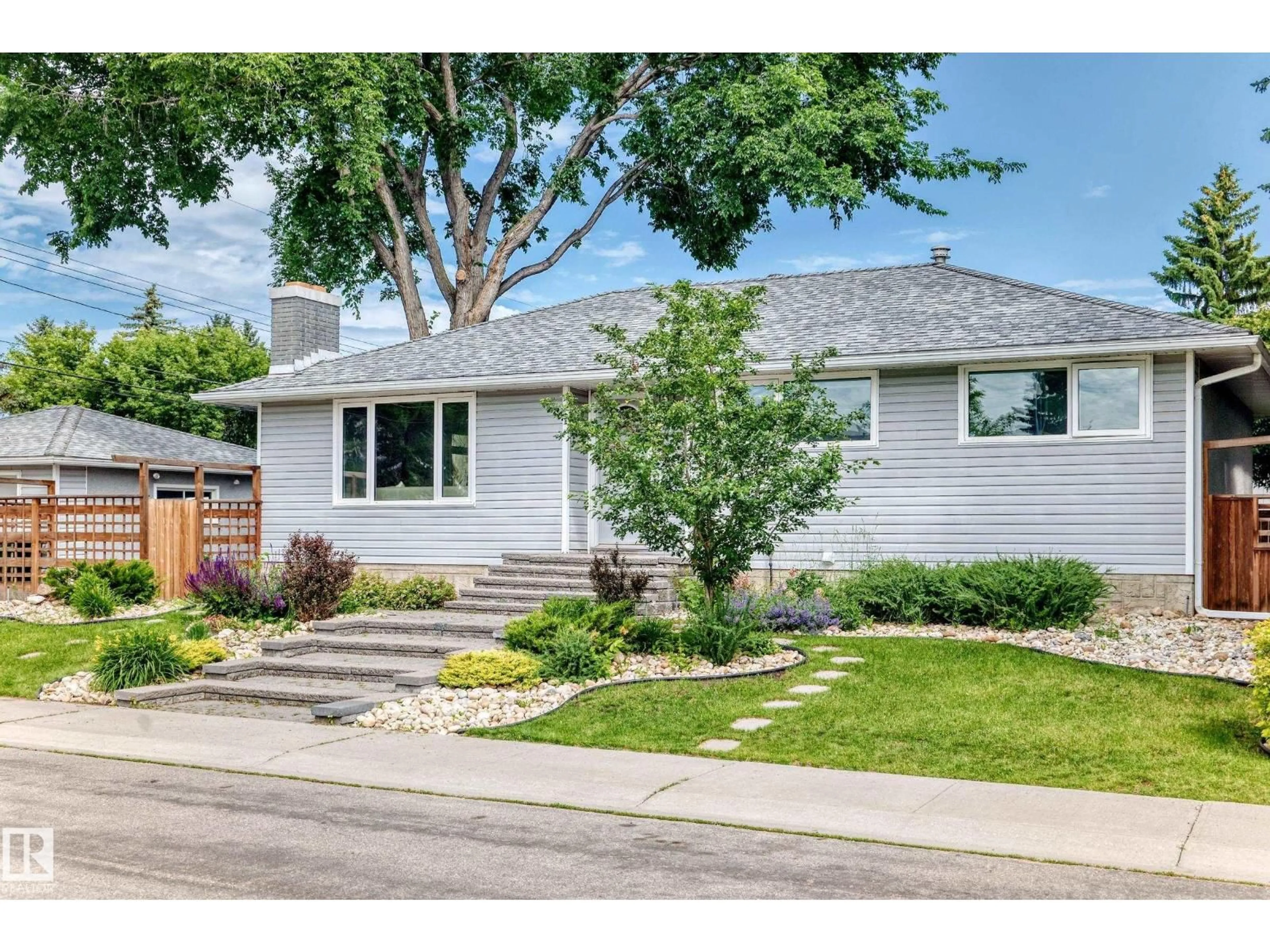 Home with vinyl exterior material, street for NW - 16406 87A AV, Edmonton Alberta T5R4H9