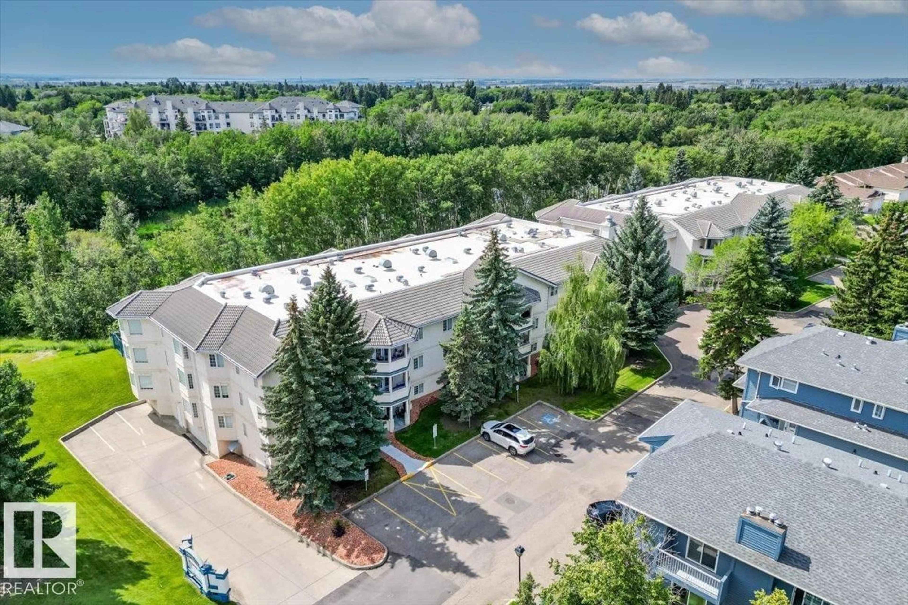 A pic from outside/outdoor area/front of a property/back of a property/a pic from drone, unknown for #307 - 45 GERVAIS RD, St. Albert Alberta T8N6H7