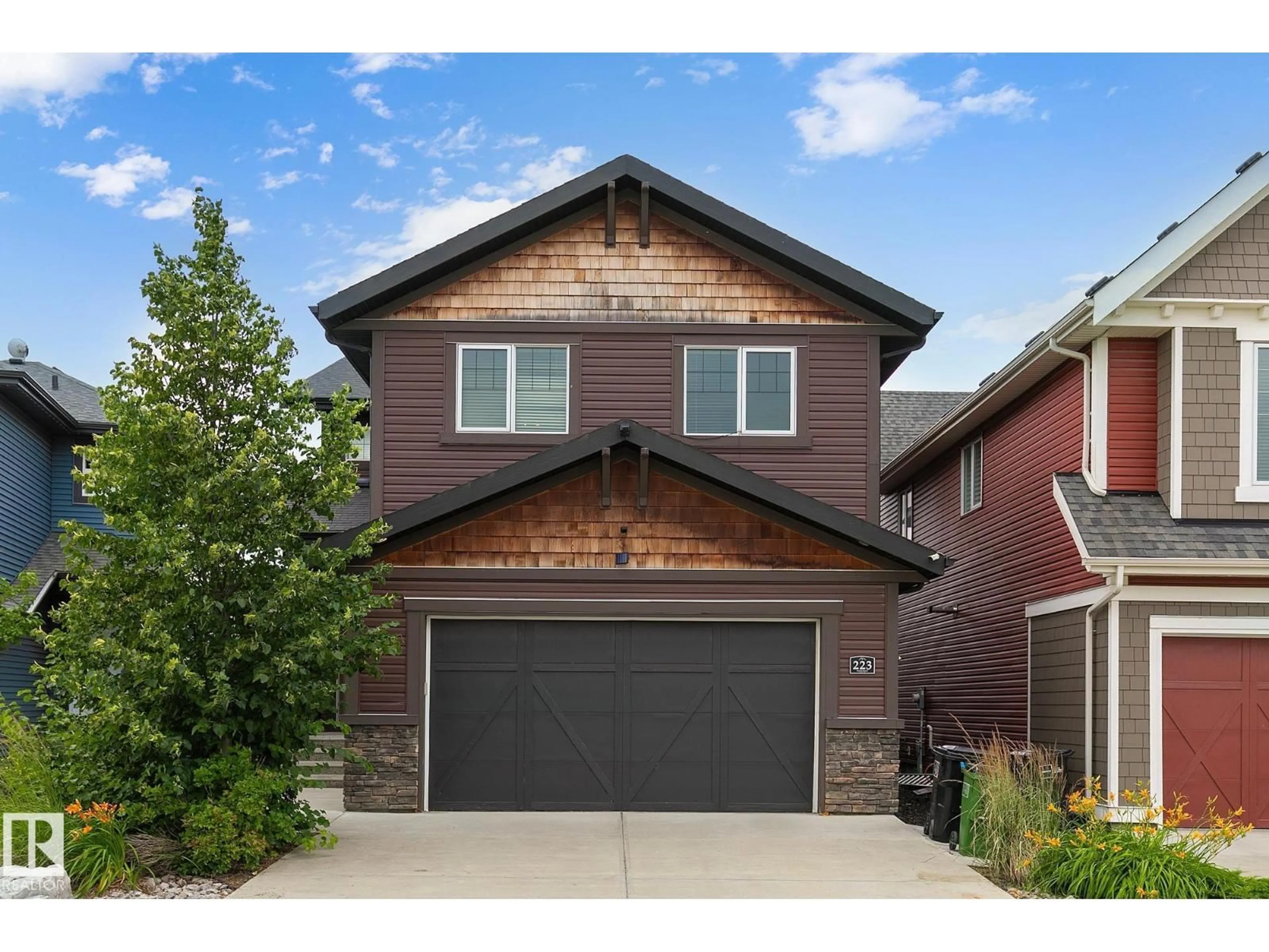 Home with brick exterior material, street for 223 HAWKS RIDGE BV, Edmonton Alberta T5S0M1