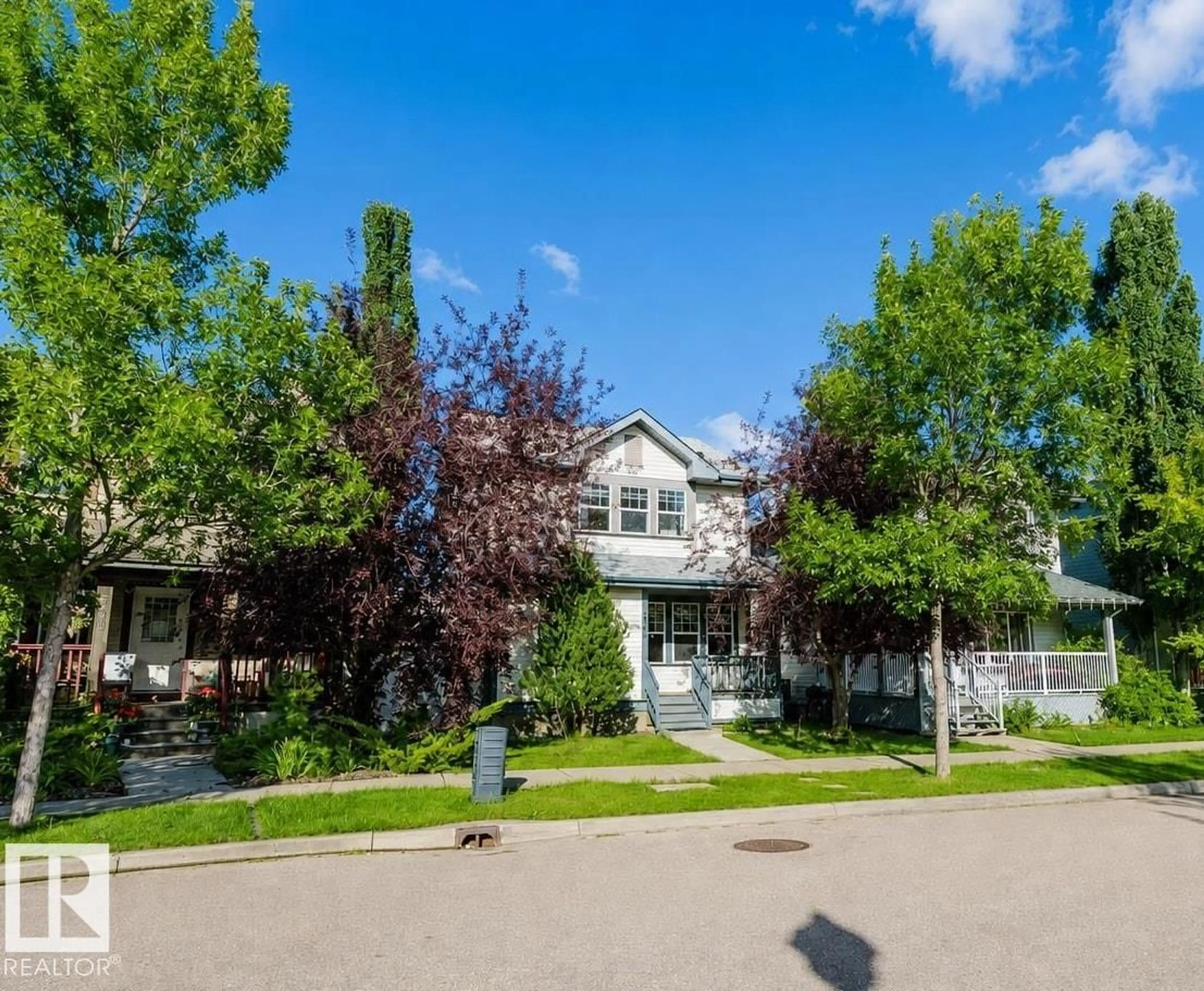 Home with vinyl exterior material, street for 5887 SUTTER PL, Edmonton Alberta T6R3R2