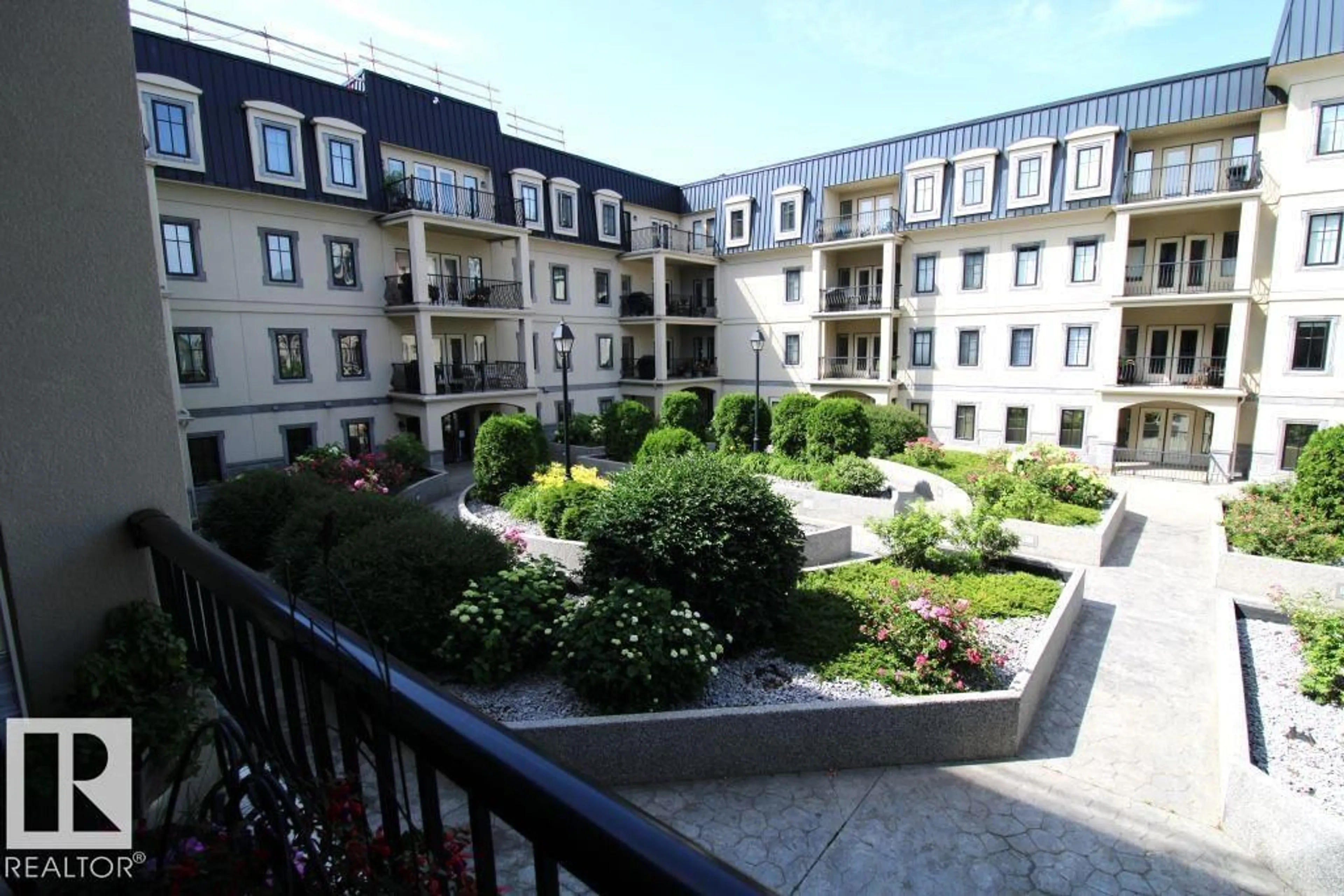 Balcony in the apartment, city buildings view from balcony for #201 - 1406 HODGSON WY, Edmonton Alberta T6R3K1