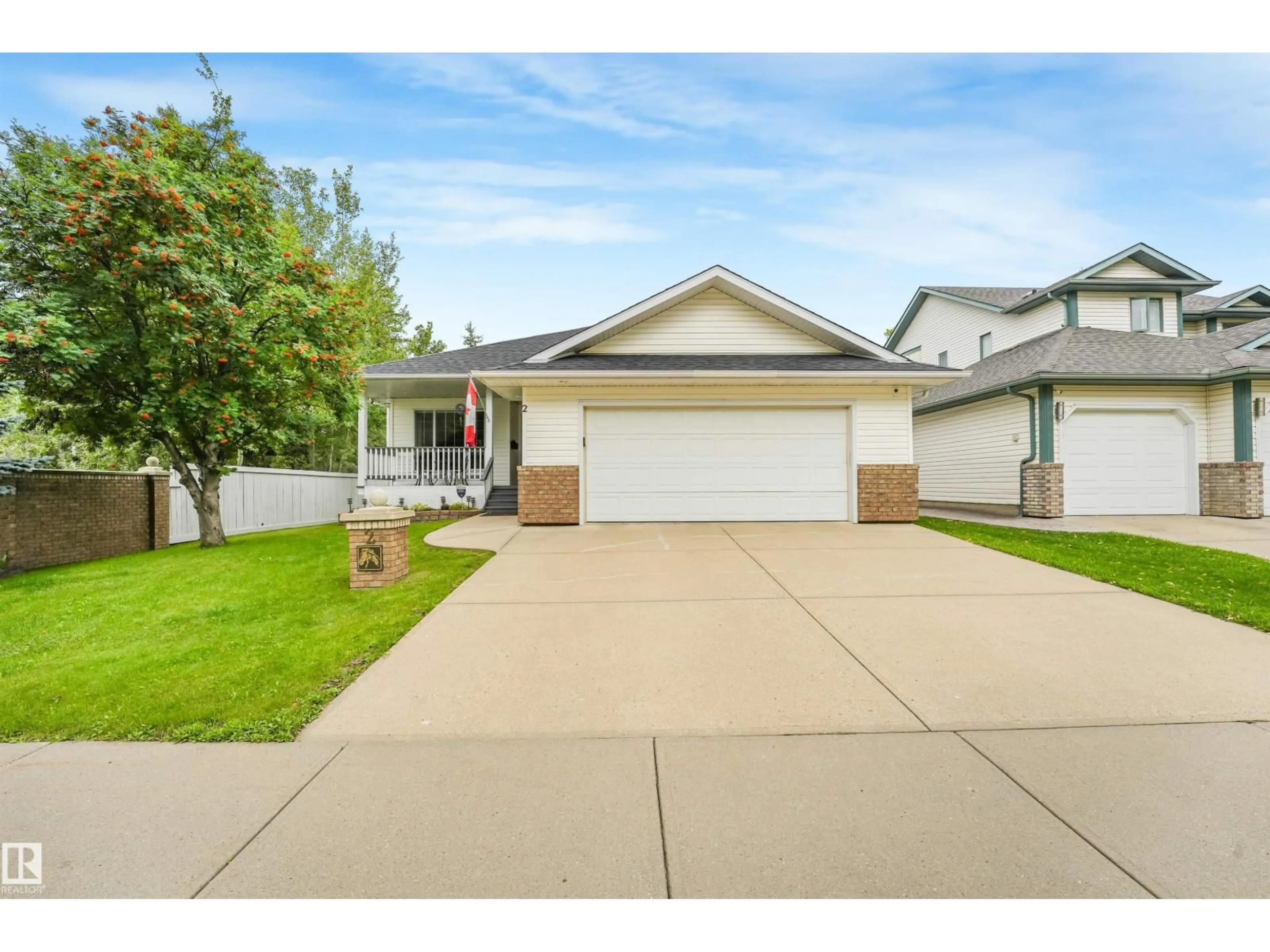 Home with vinyl exterior material, street for 2 KIRKWOOD DR, St. Albert Alberta T8N6J3