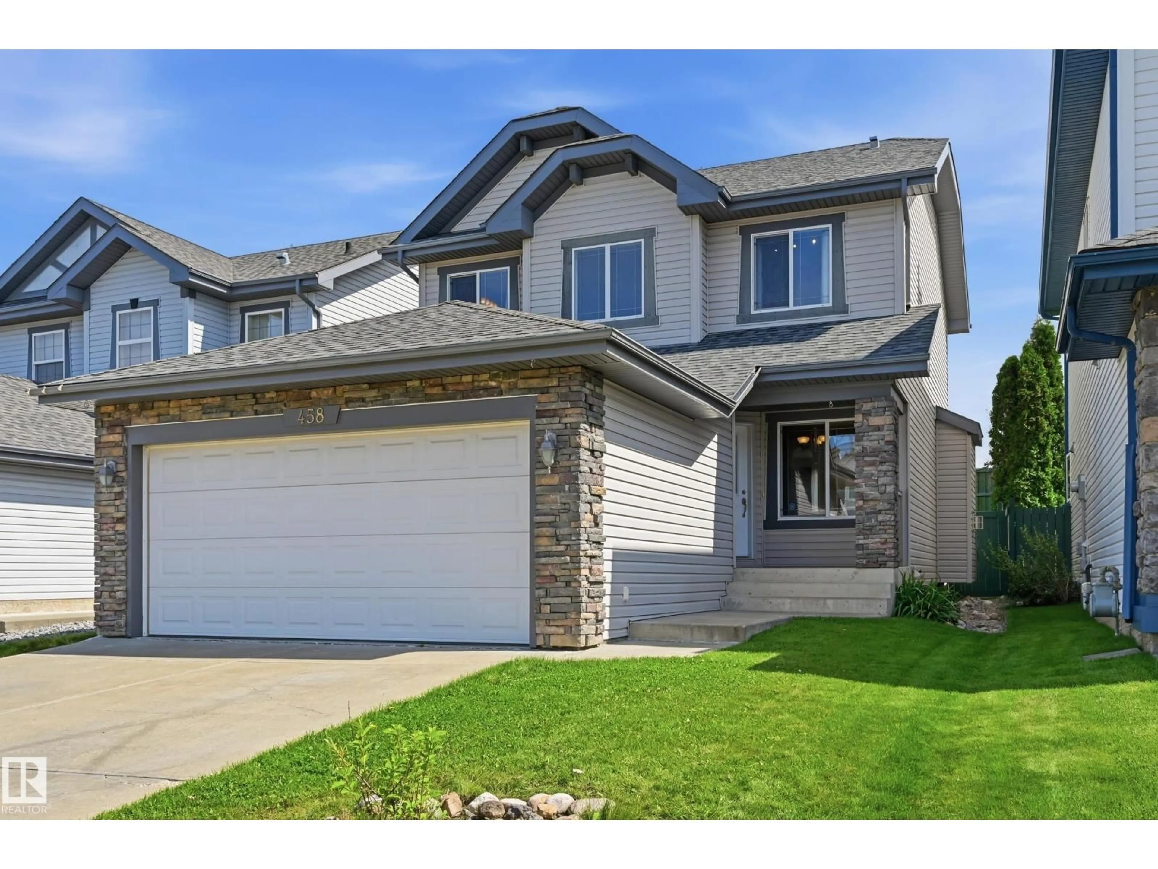 Home with vinyl exterior material, street for 458 HUNTERS GREEN GR, Edmonton Alberta T6R3C3