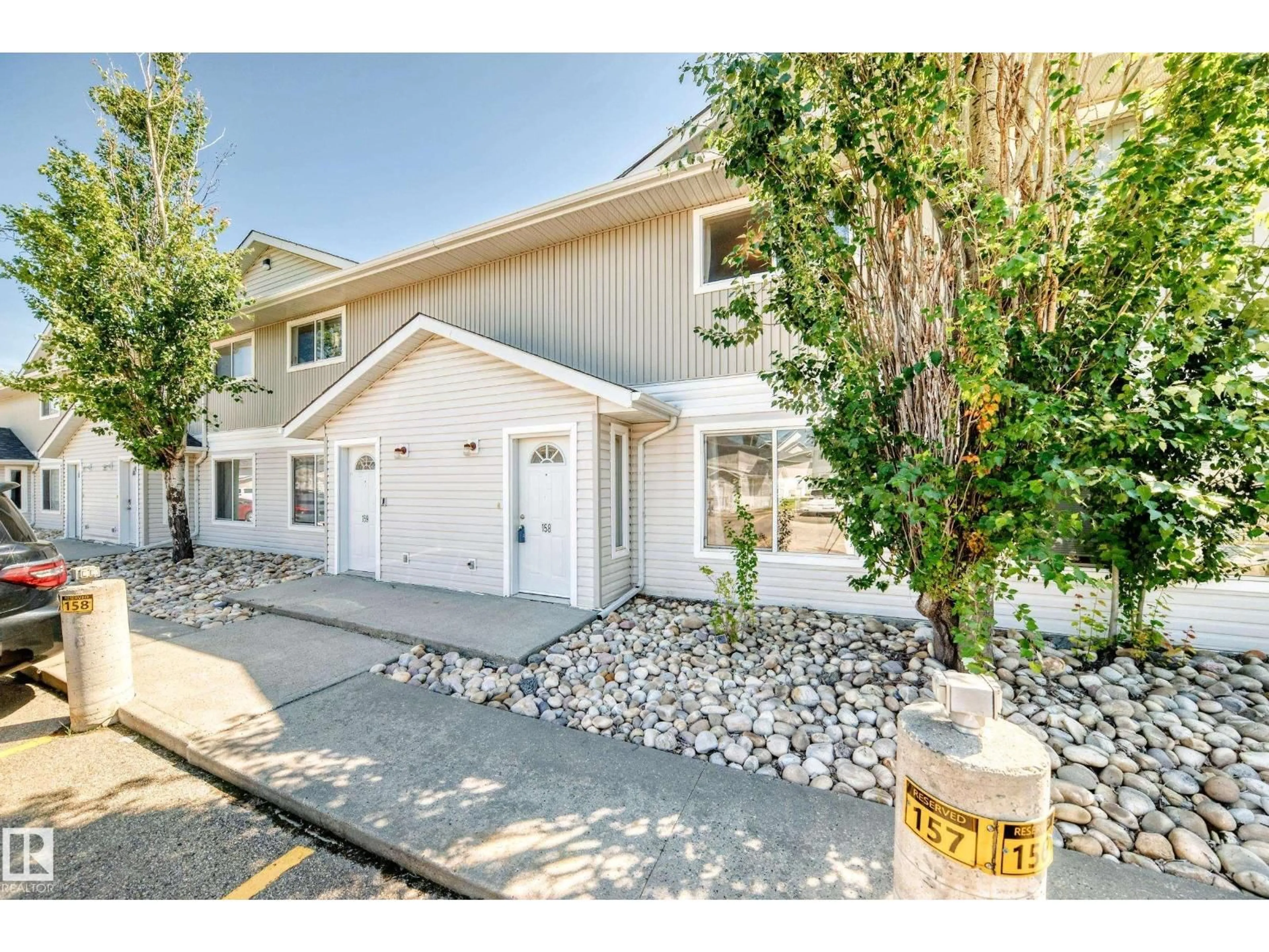 Home with vinyl exterior material, street for 158 180 BRIDGEPORT BV, Leduc Alberta T9E8S1