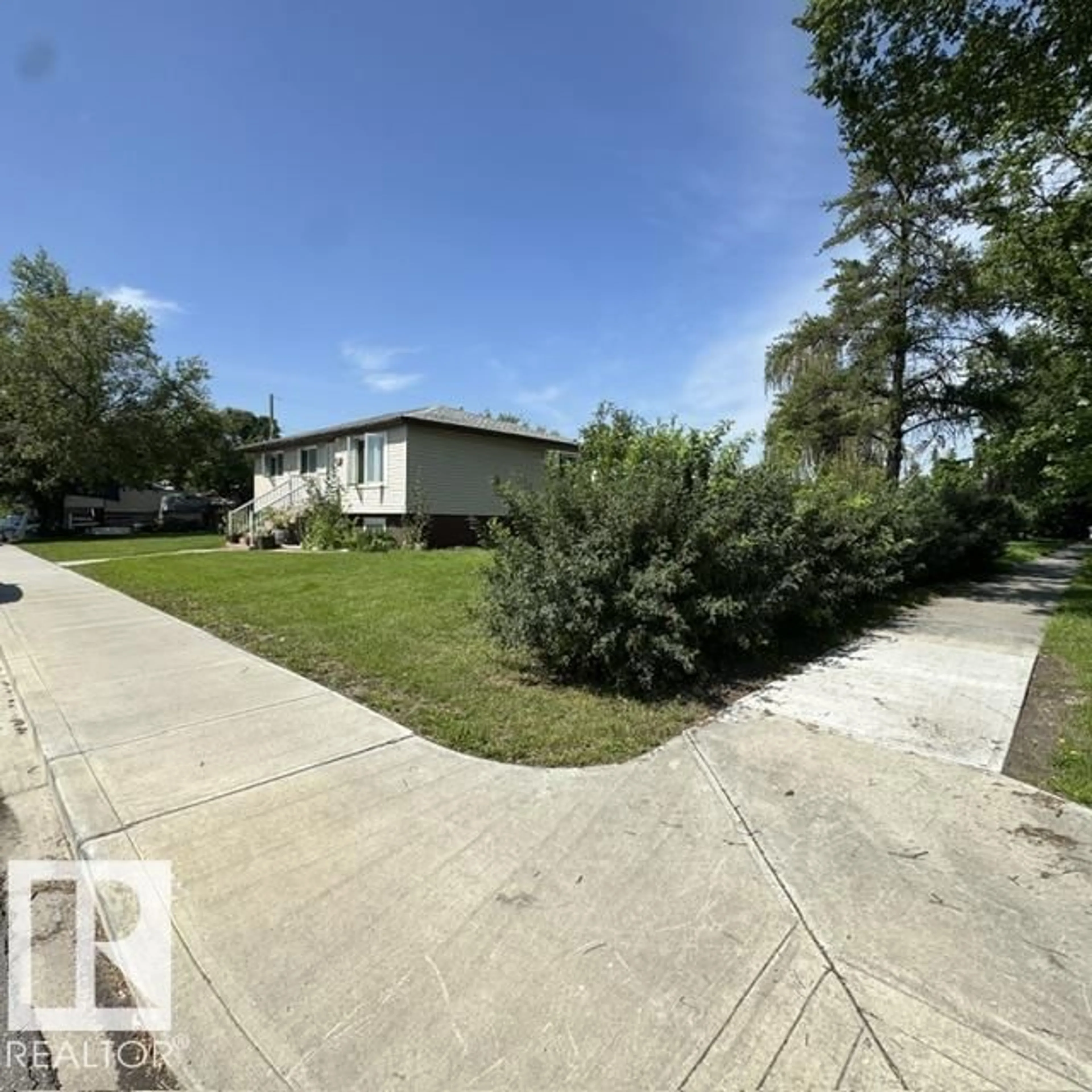 A pic from outside/outdoor area/front of a property/back of a property/a pic from drone, street for 11404 127 AV, Edmonton Alberta T5E0C6